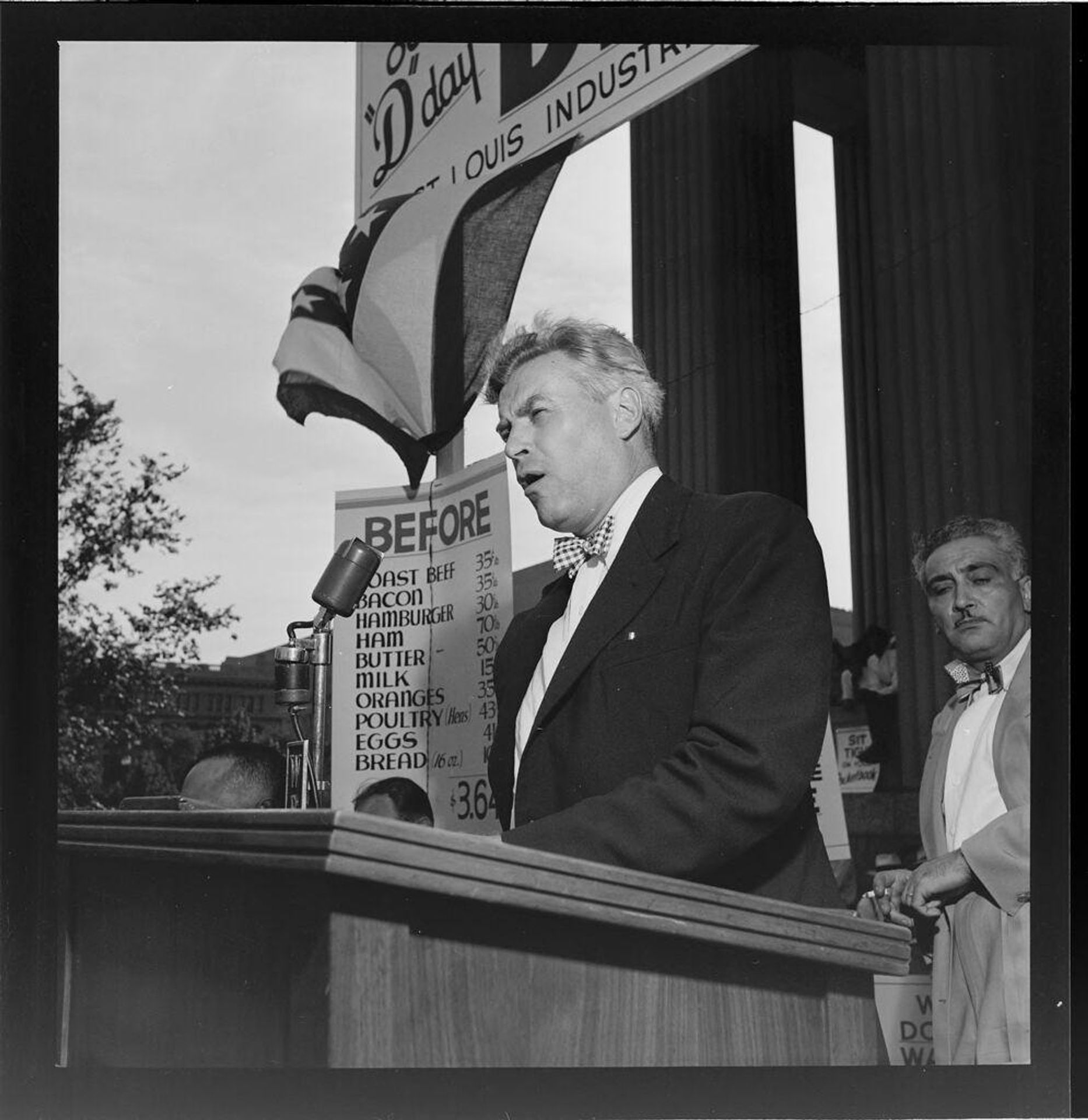 Untitled (men giving speeches at podium) by Jack Gould