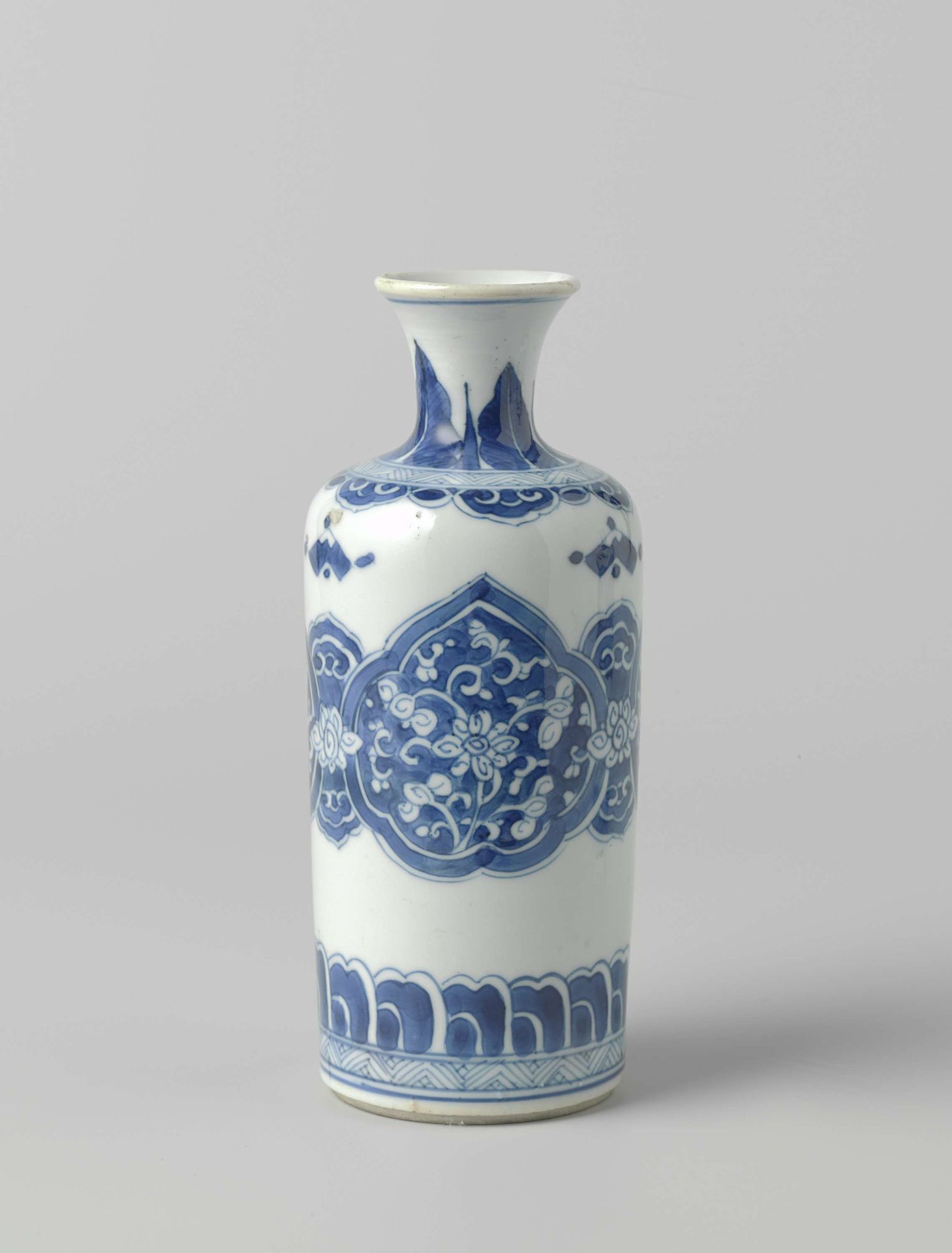 Cilindrical bottle vase with floral scrolls in reserve in ruyi-shaped panels by Anonymous