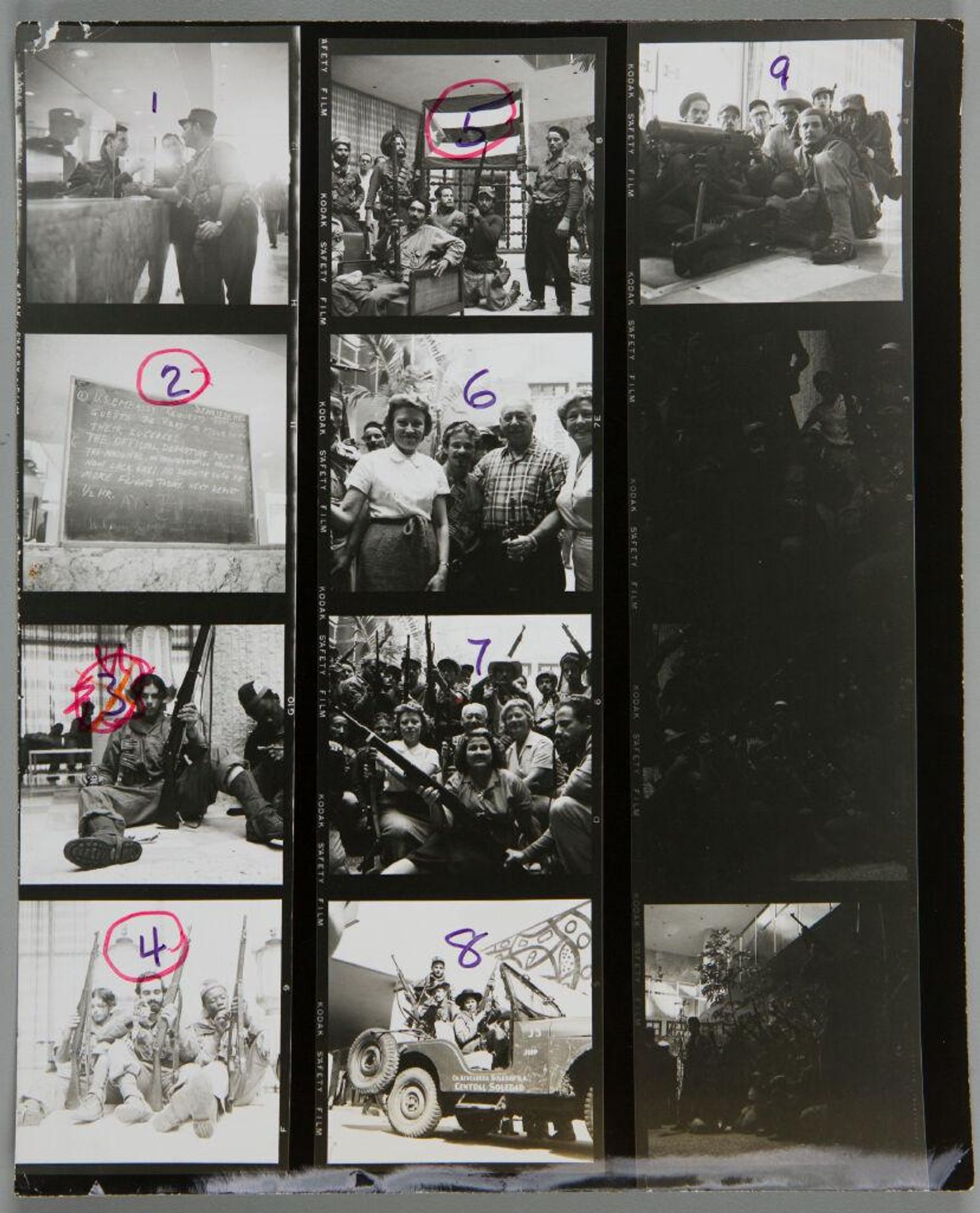 Untitled (twelve photographs: Cuban revolutionaries, with guns and in meetings) by Lester Cole