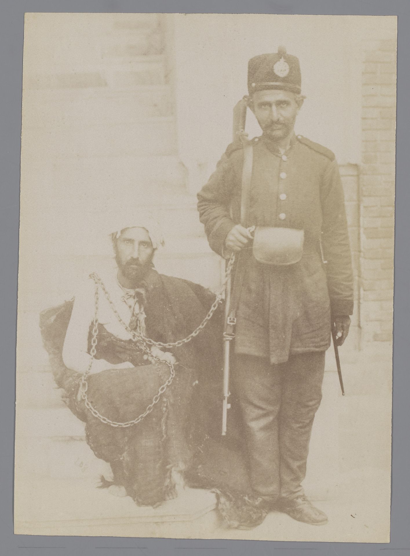 Portret van twee mannen: een gevangene en een bewaker, Iran by Antoine Sevruguin
