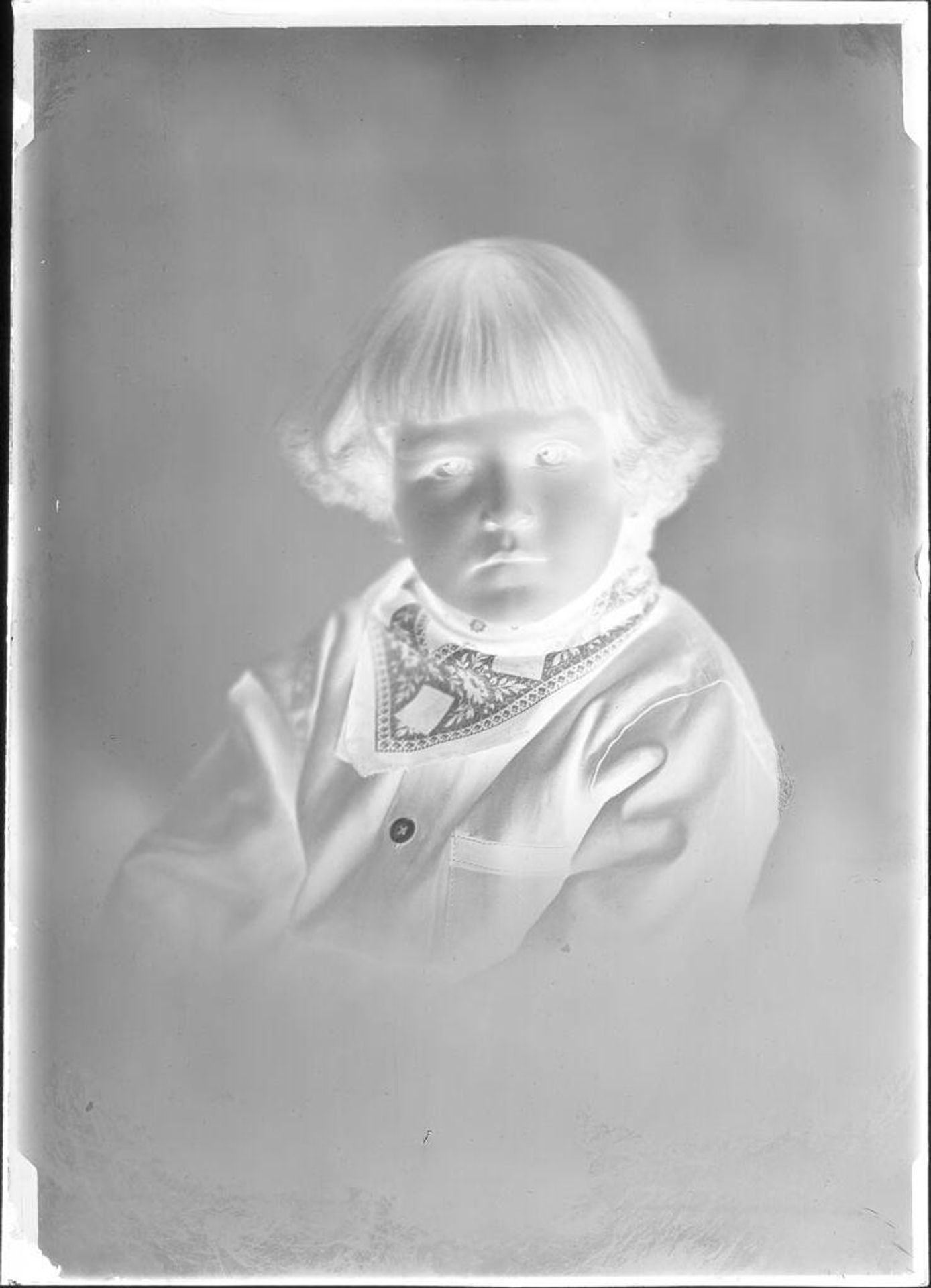 Untitled (portrait of child in bandana) by John Deusing