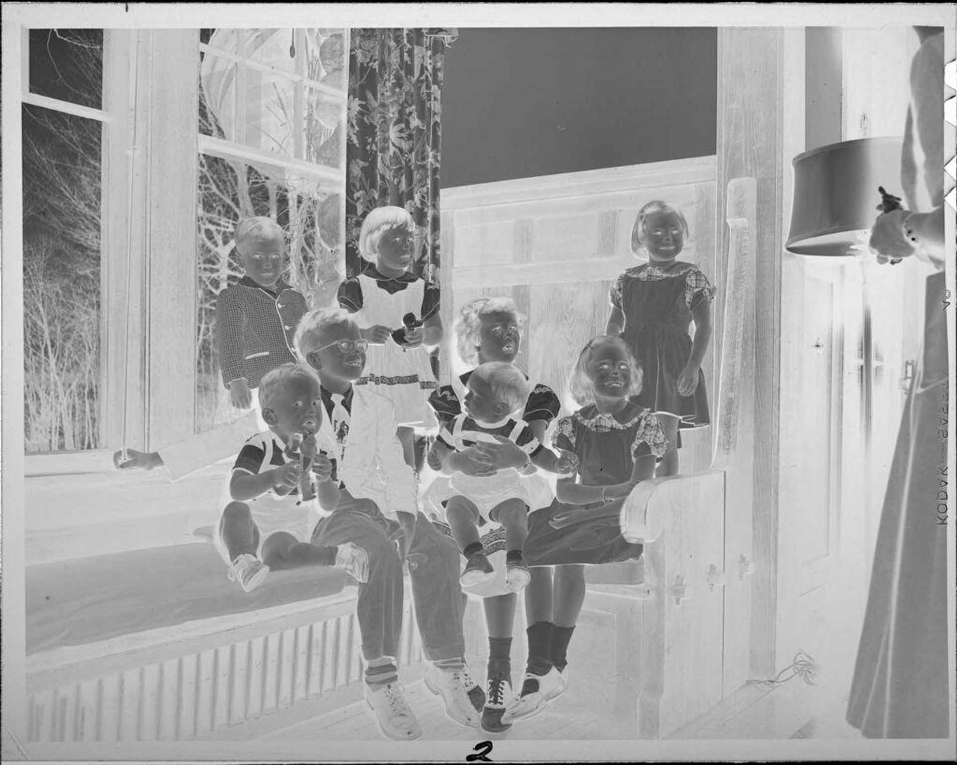 Untitled (portrait of children inside house) by Lucian and Mary Brown