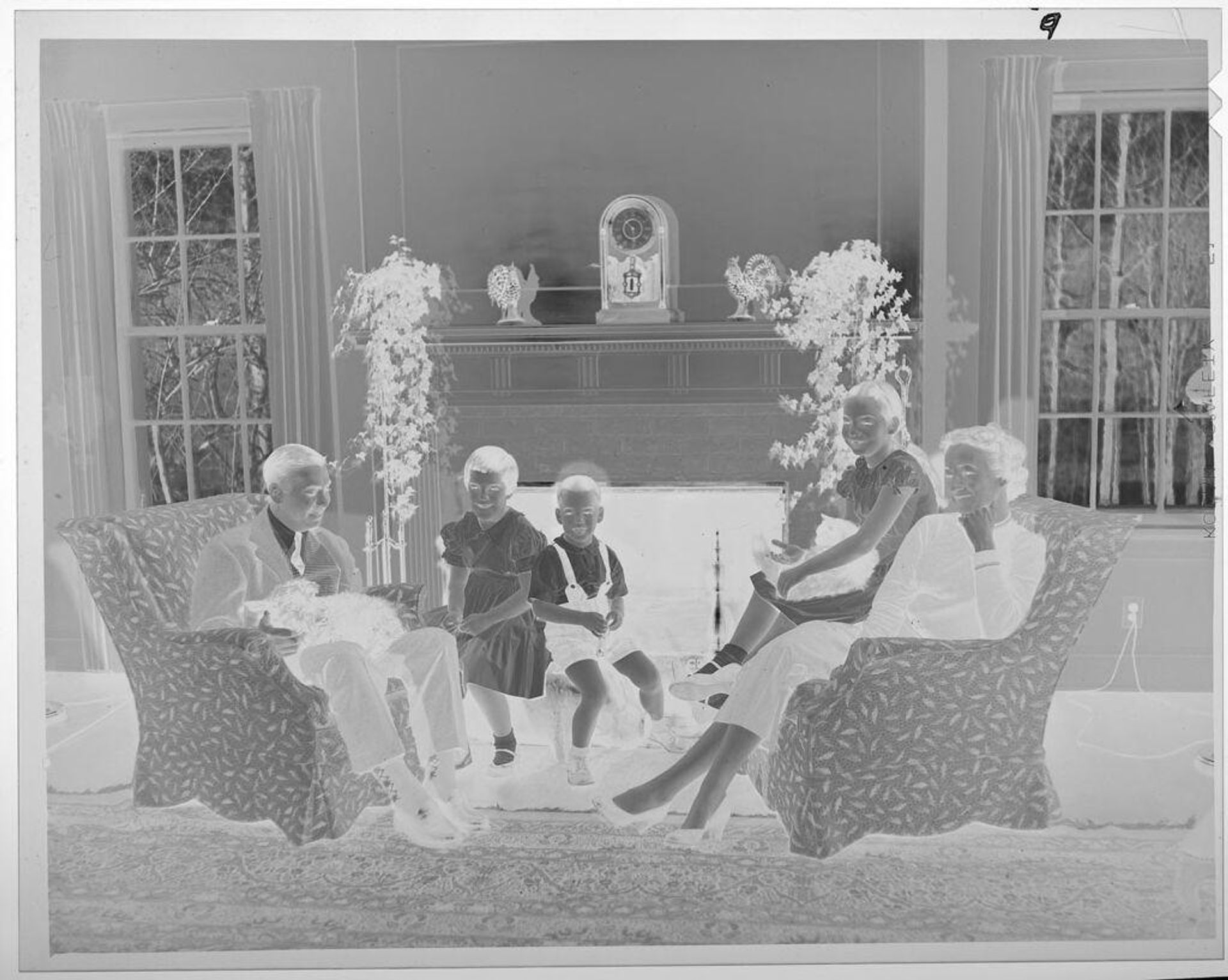 Untitled (family portrait in living room) by Lucian and Mary Brown