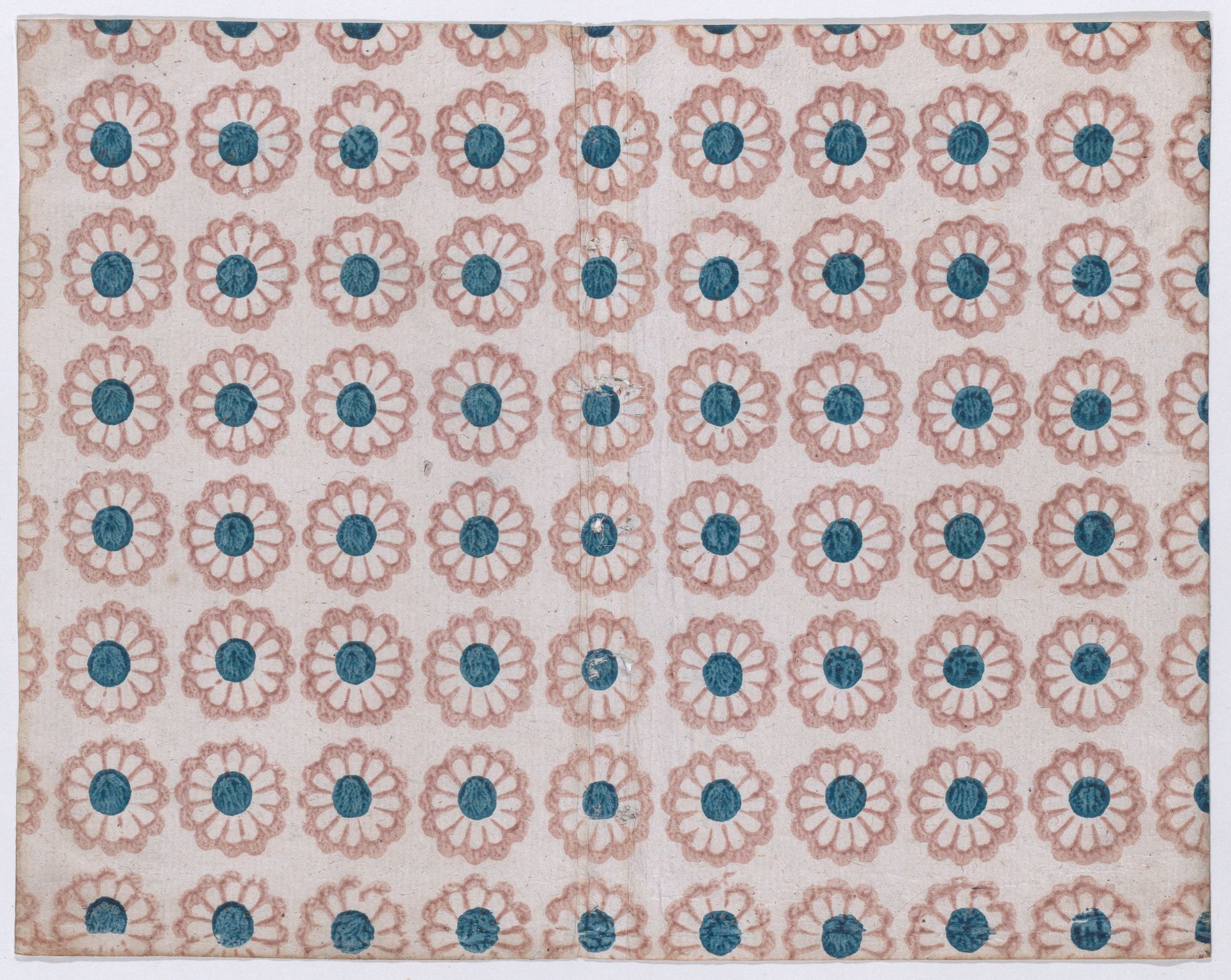 Sheet with overall pattern of pink flowers with blue centers by Anonymous