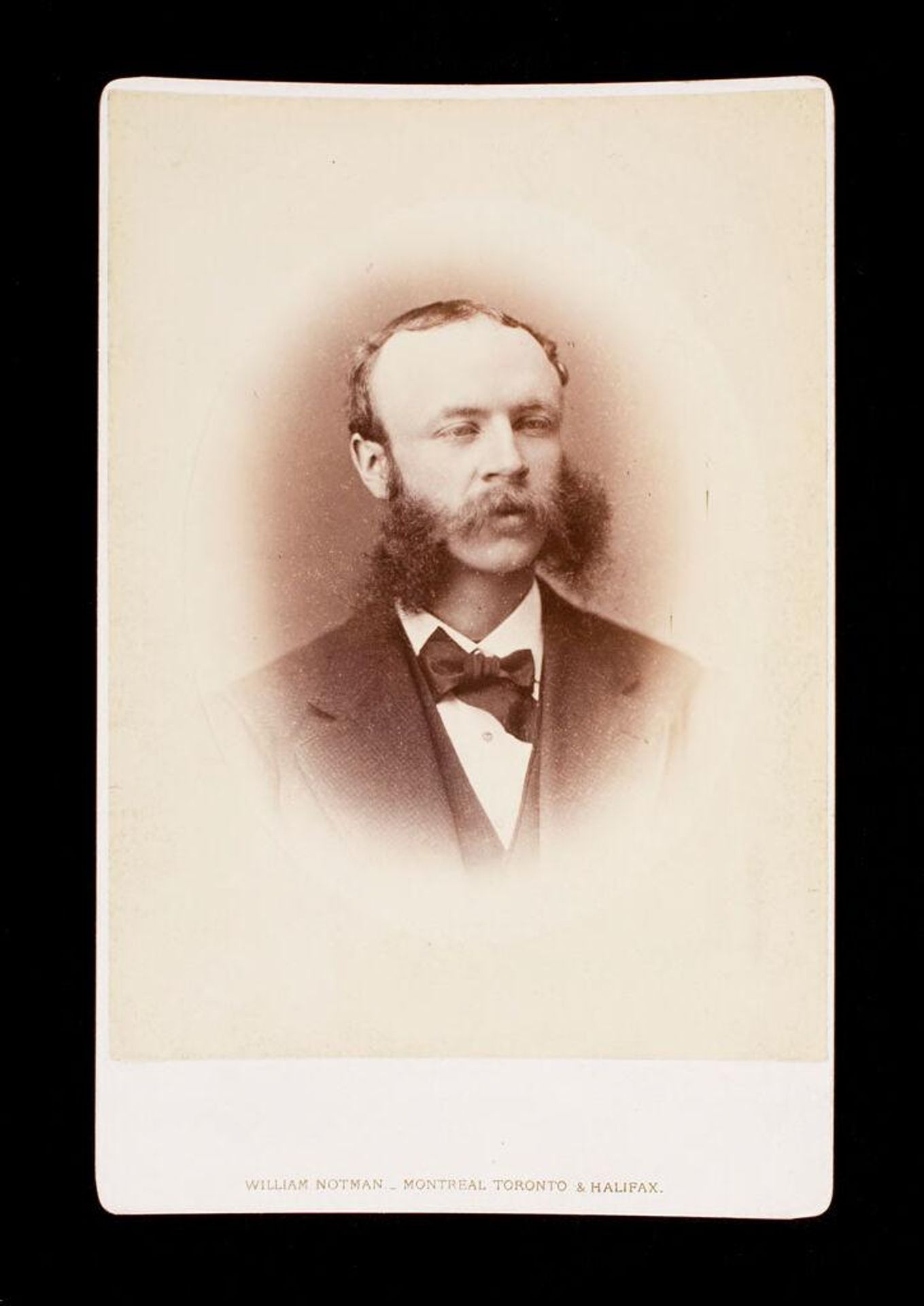 Untitled (bust length portrait of man with moustache, long side whiskers and thinning hair labeled Fiske) by William Notman