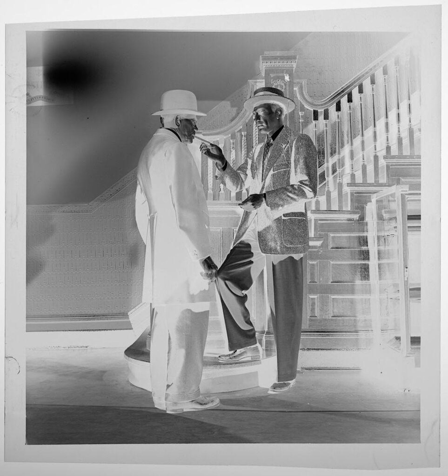 Untitled (two men in front of staircase) by Jack Gould