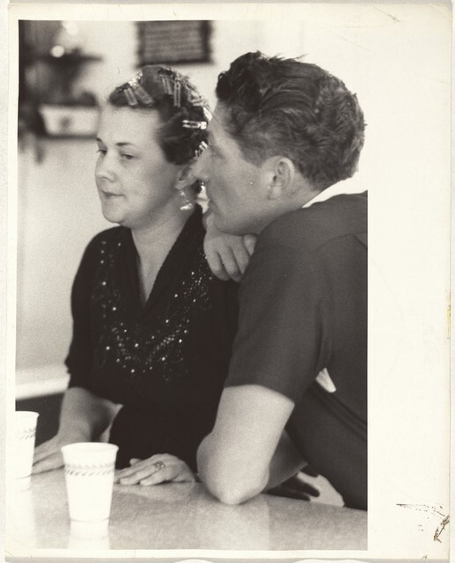 Couple at lunch counter--between Las Vegas and Los Angeles by Robert Frank