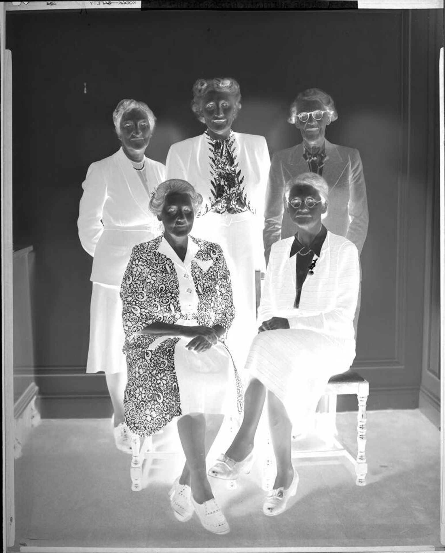 Untitled (women posed in suits, Red Cross) by Harris & Ewing