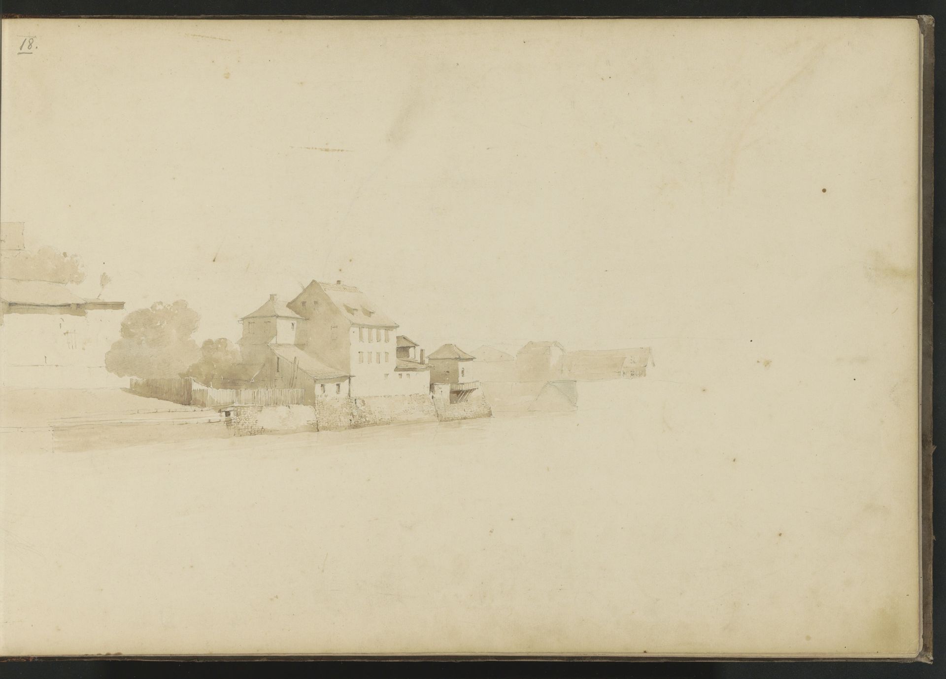 Huizen aan een kade by Kasparus Karsen