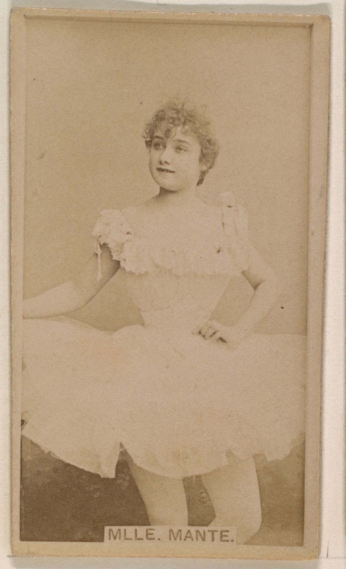 Mlle. Mante, from the Actresses series (N245) issued by Kinney Brothers to promote Sweet Caporal Cigarettes by Kinney Brothers Tobacco Company