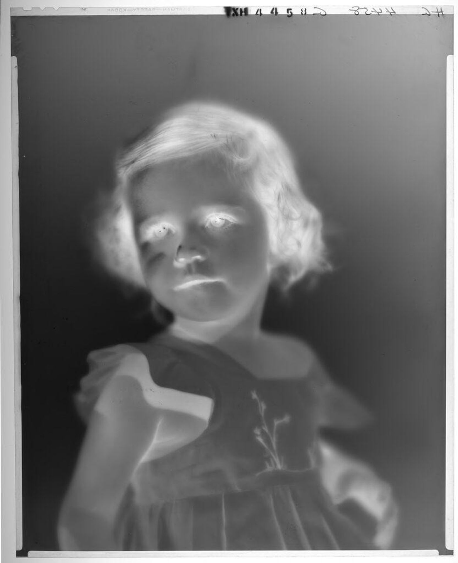 Untitled (portrait of little girl in sundress with floral motif) by Paul Gittings