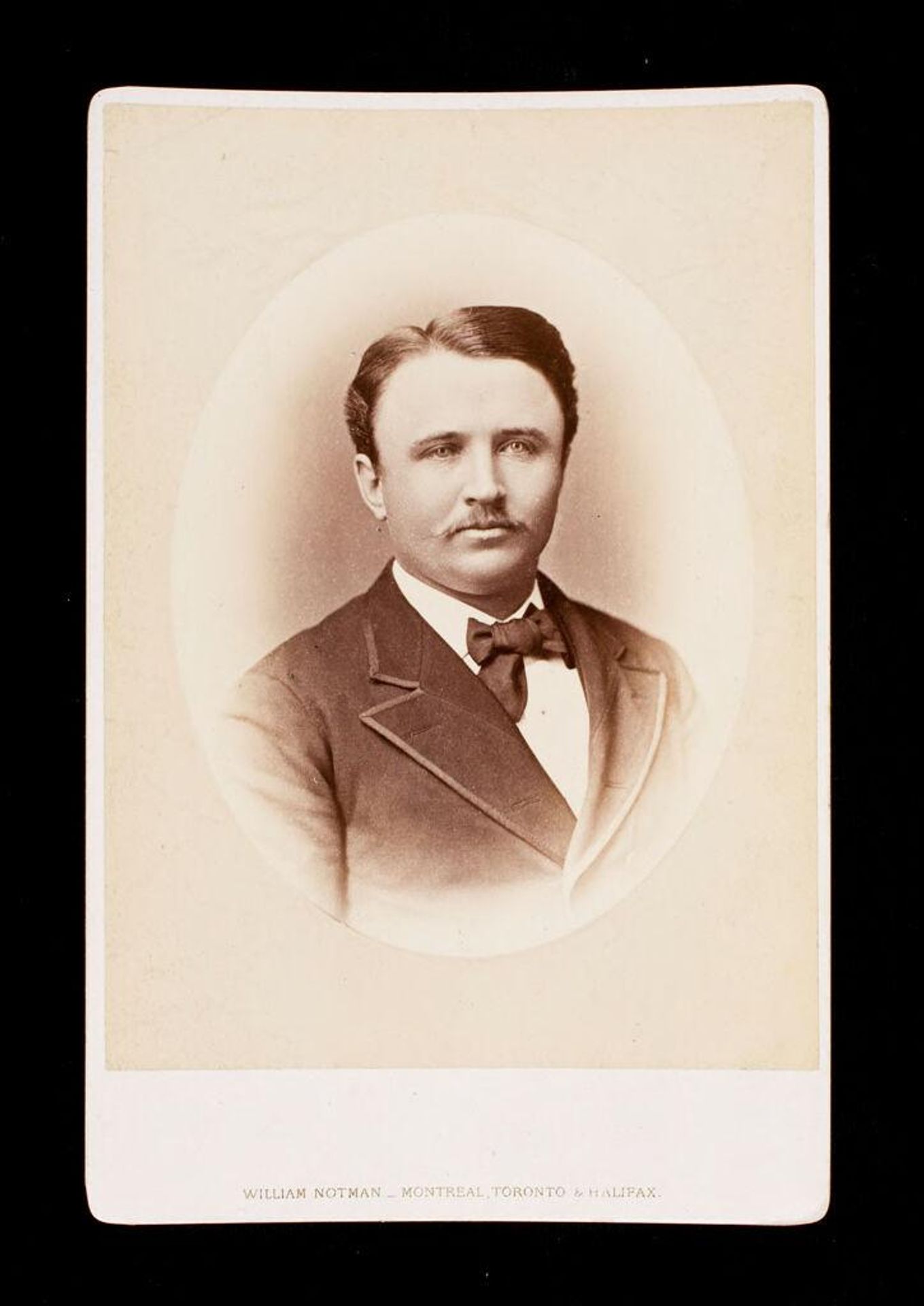 Untitled (bust length portrait of man with moustache labeled J. J. Myers, '75) by William Notman