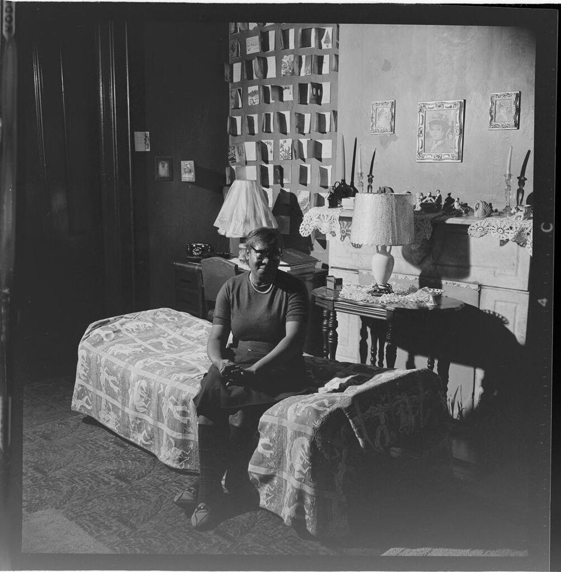 Untitled (family inside run-down house) by Jack Gould