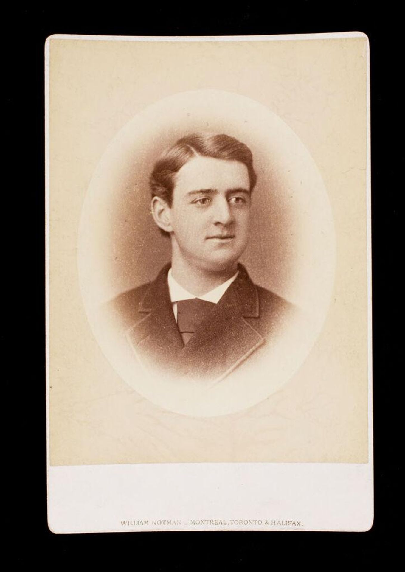 Untitled (bust length portrait of man labeled R. Gray, possibly Reginald Gray, A.B. 1875) by William Notman