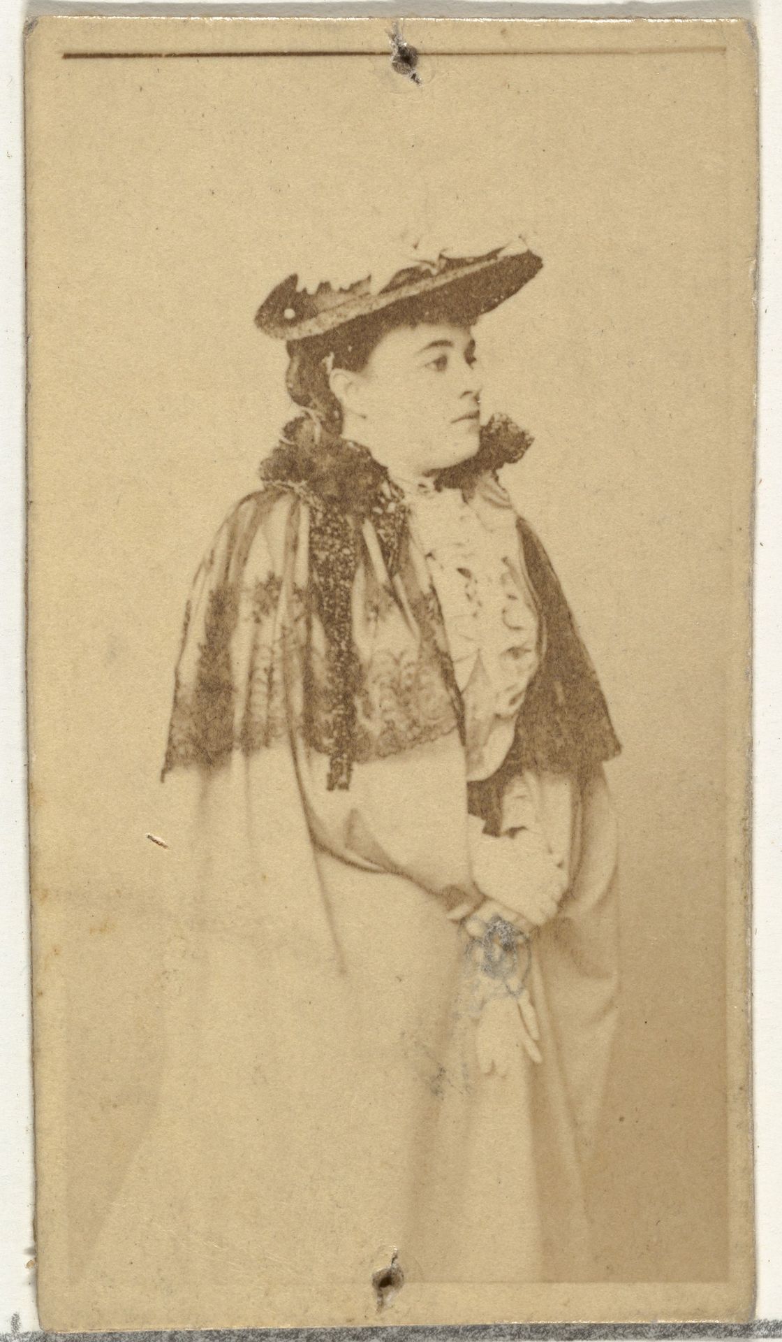 [Actress wearing cloak with lace details], from the Actors and Actresses series (N145-8) issued by Duke Sons & Co. to promote Duke Cigarettes by W. Duke, Sons & Co.