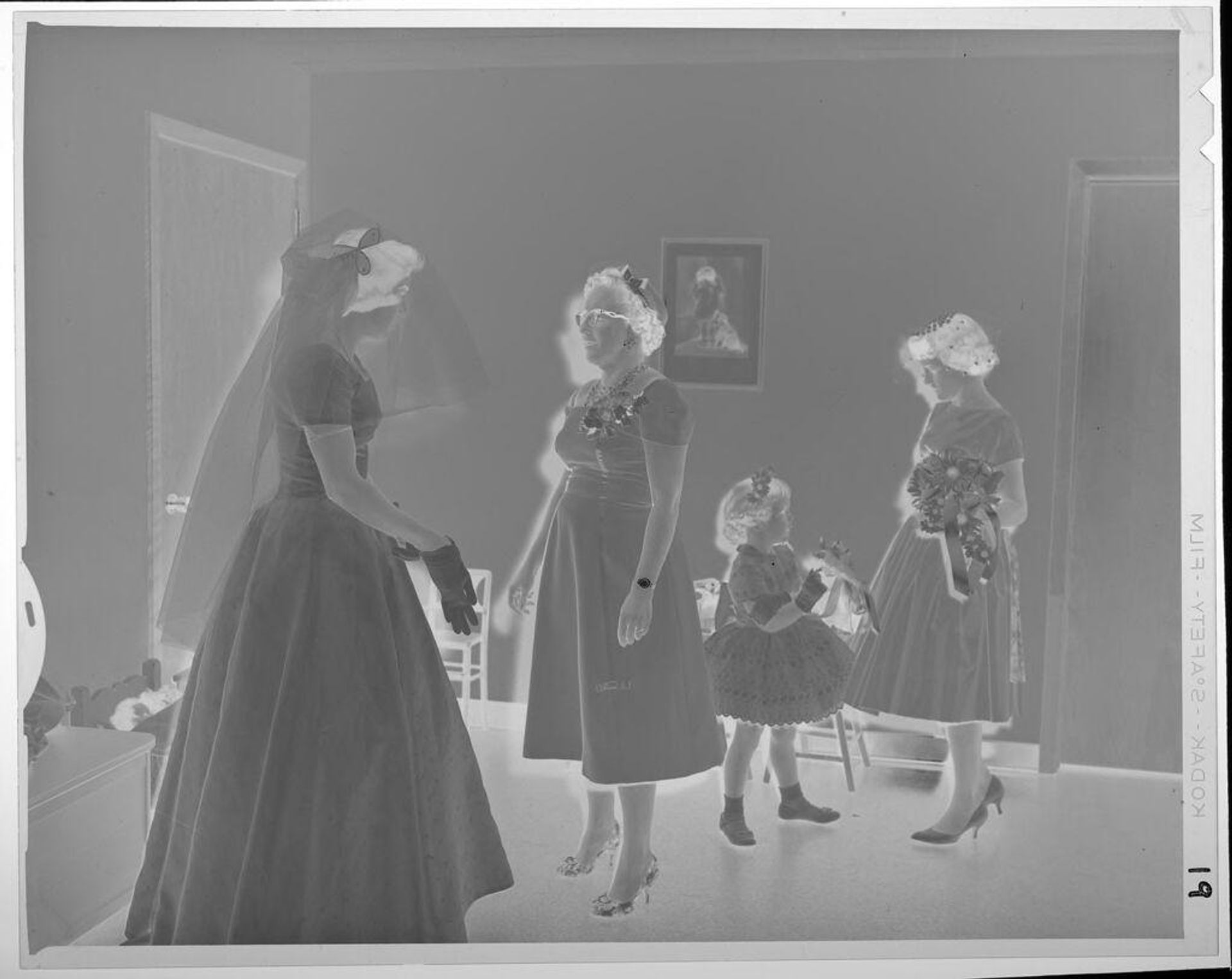 Untitled (bride with two woman and one girl) by Lucian and Mary Brown