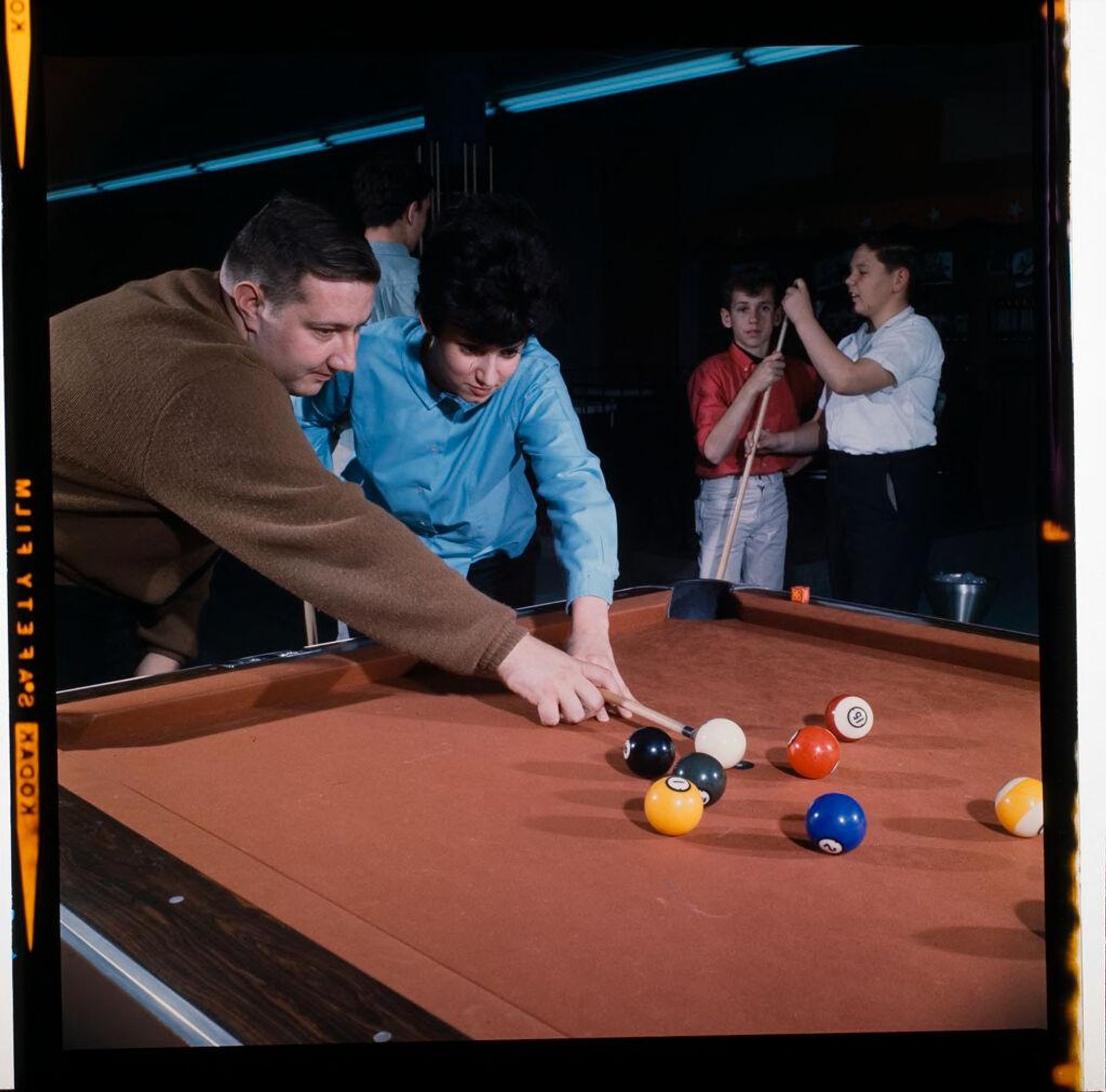Untitled (woman and man playing pool) by Jack Gould