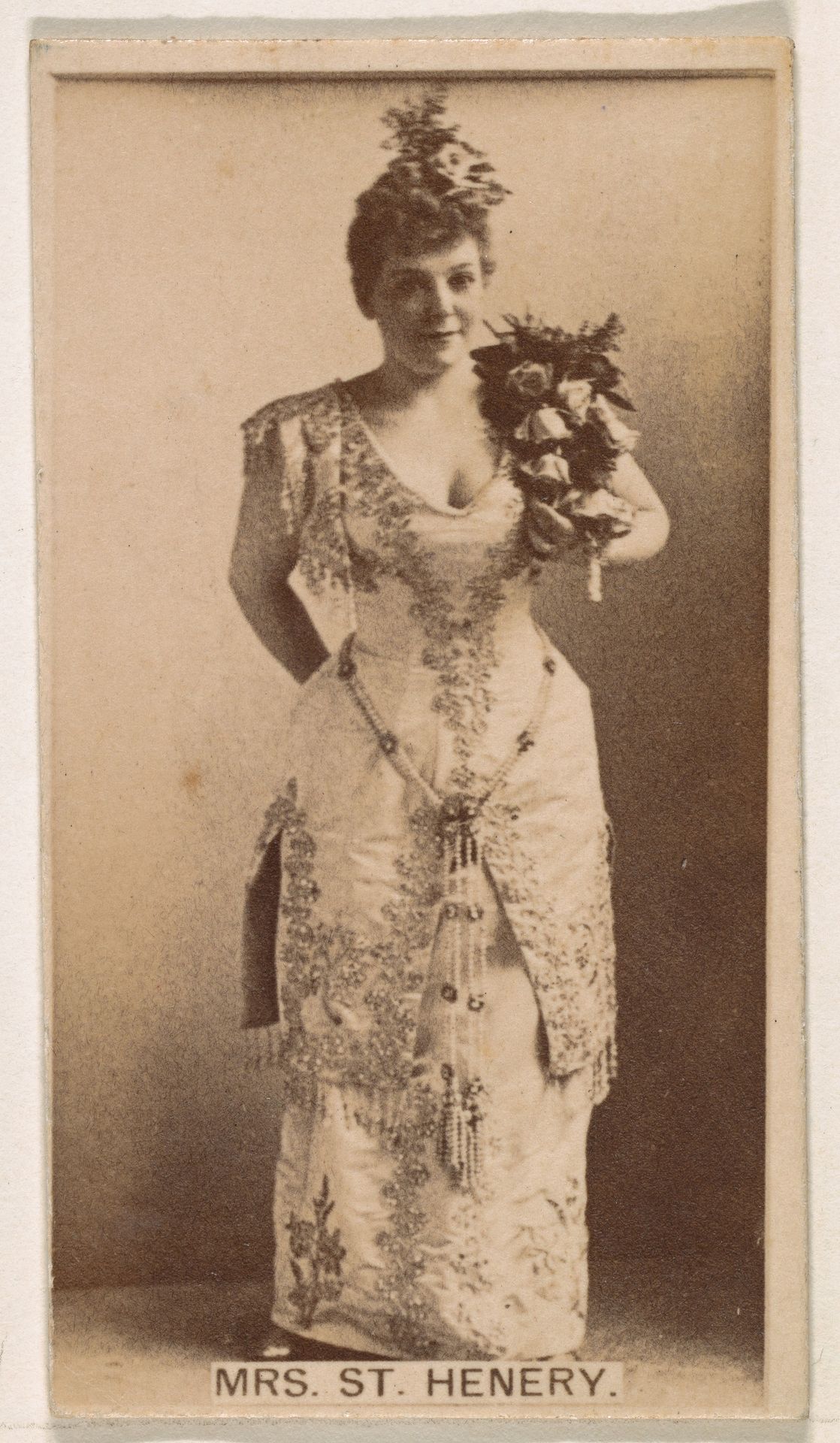Mrs. St. Henery, from the Actresses series (N245) issued by Kinney Brothers to promote Sweet Caporal Cigarettes by Kinney Brothers Tobacco Company