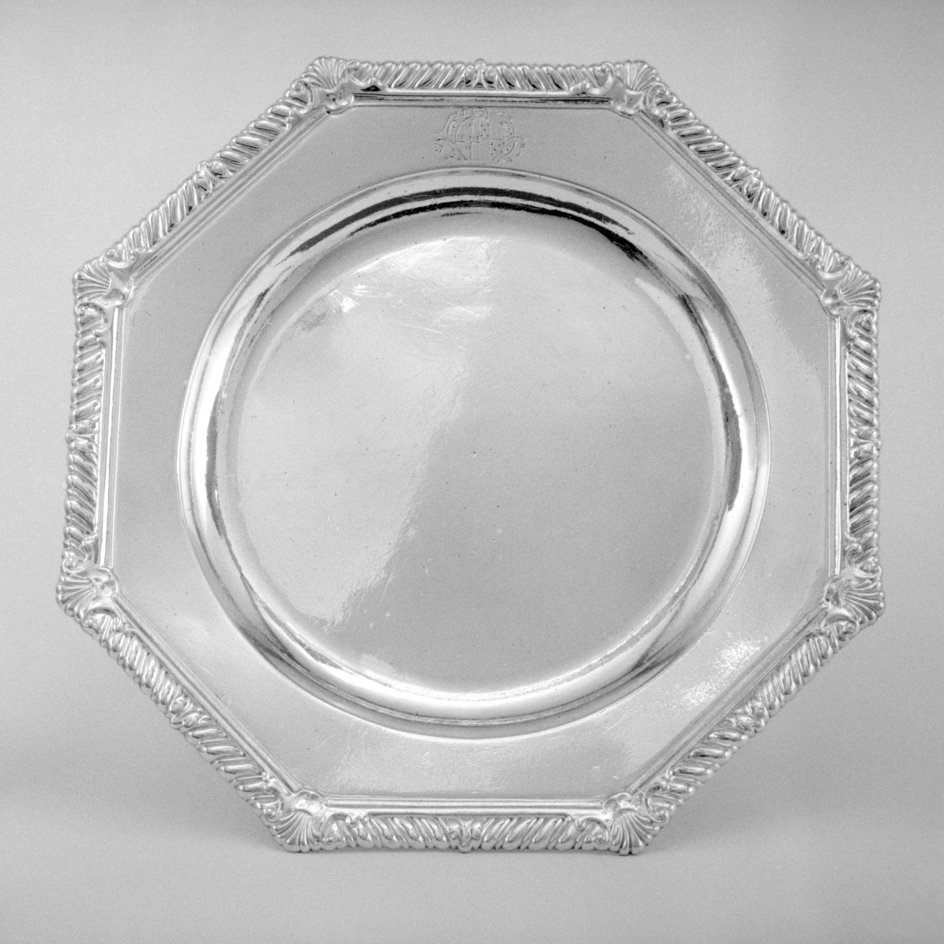 Set of four dishes by Paul de Lamerie