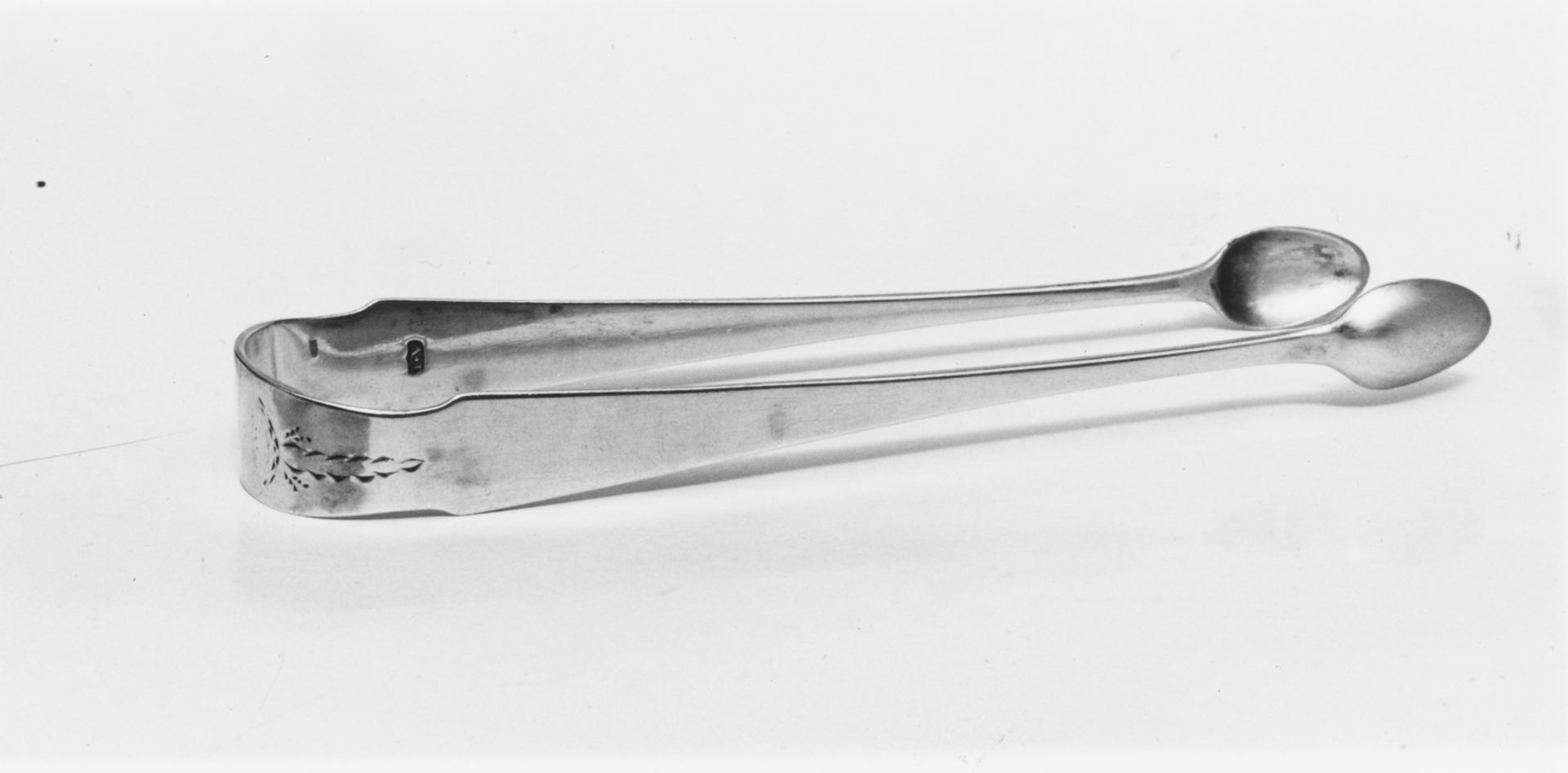 Tongs by John Vernon