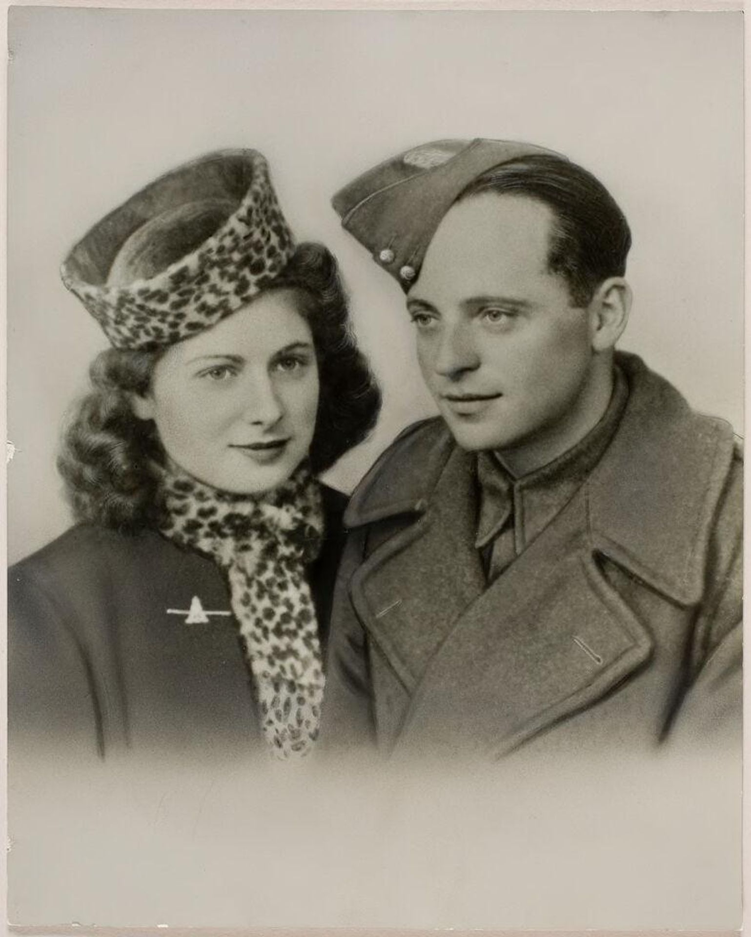 Untitled (retouched portrait of couple, man in military hat) by Robert Burian