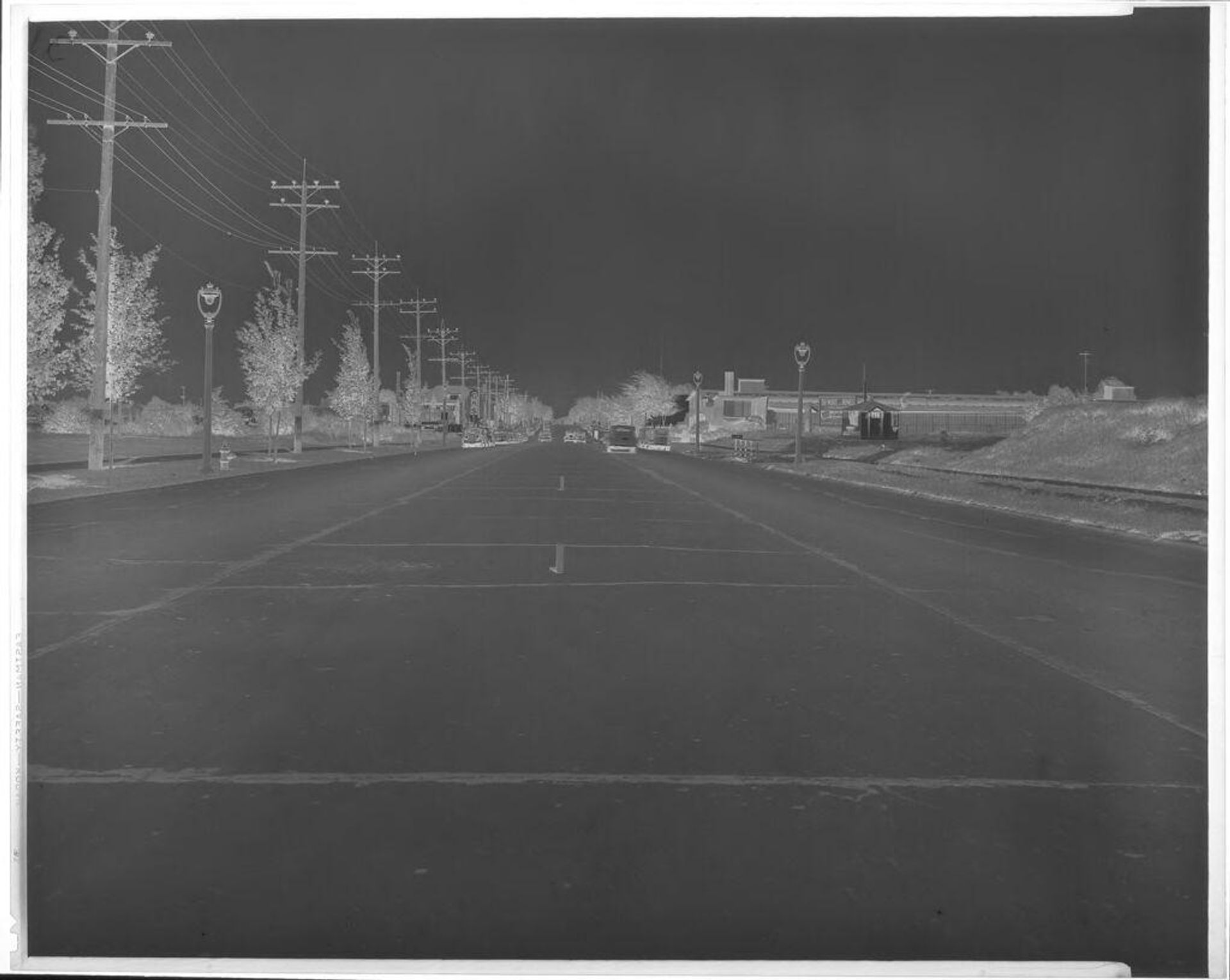 Untitled (view down street) by John Deusing