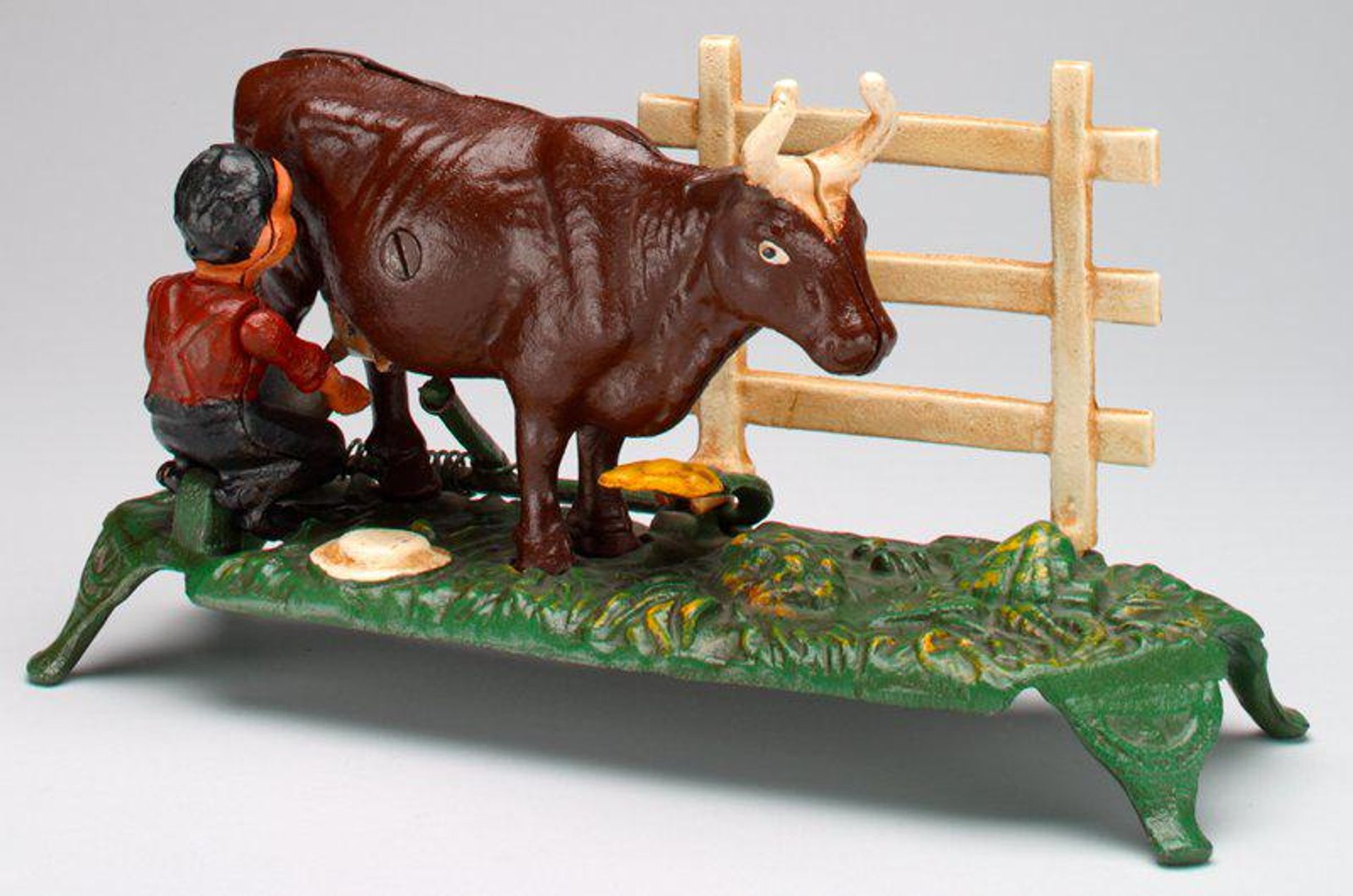 -Milking Cow- (reproduction) mechanical bank by Book of Knowledge (Grolier, Inc.)