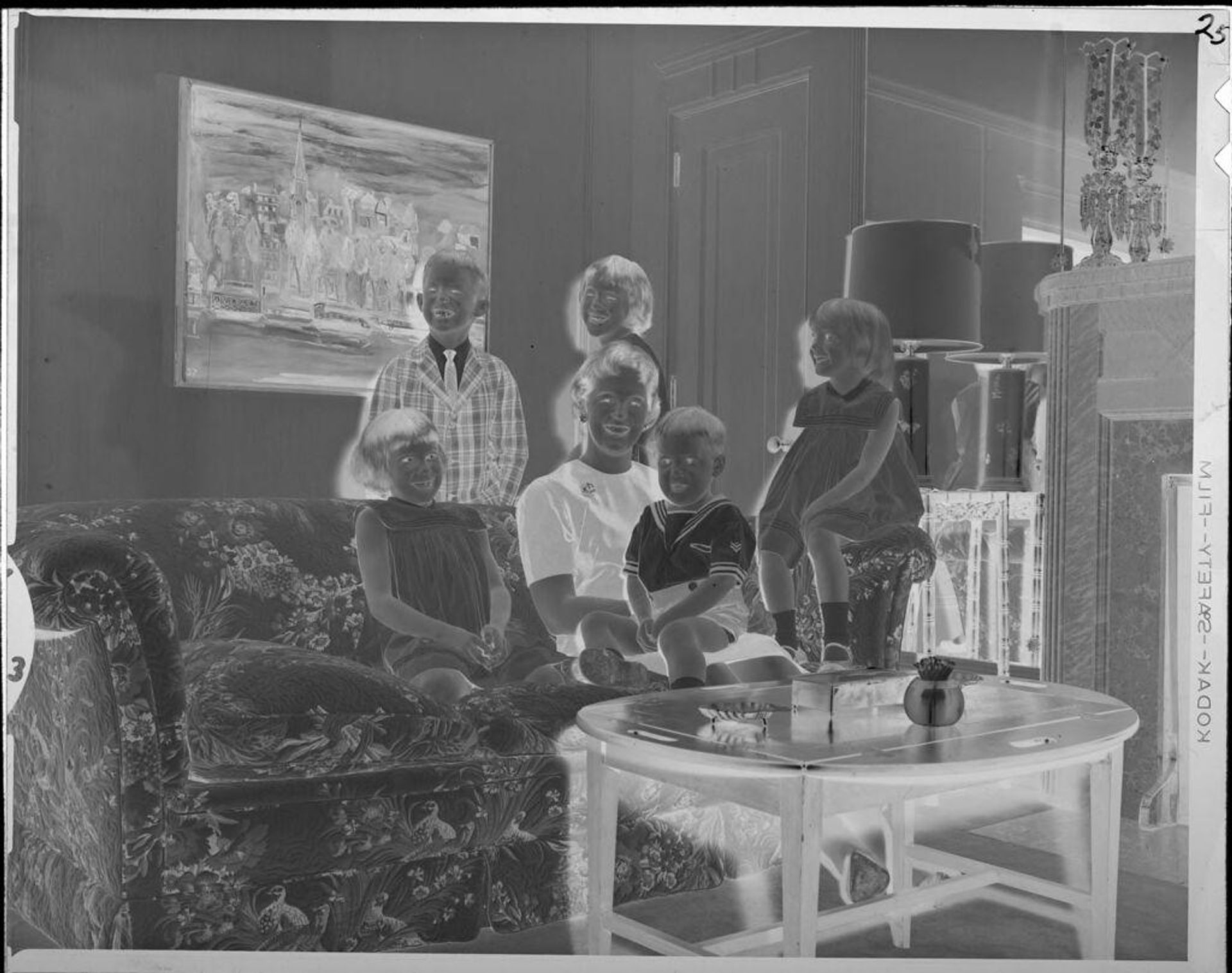 Untitled (portrait of family on couch) by Lucian and Mary Brown