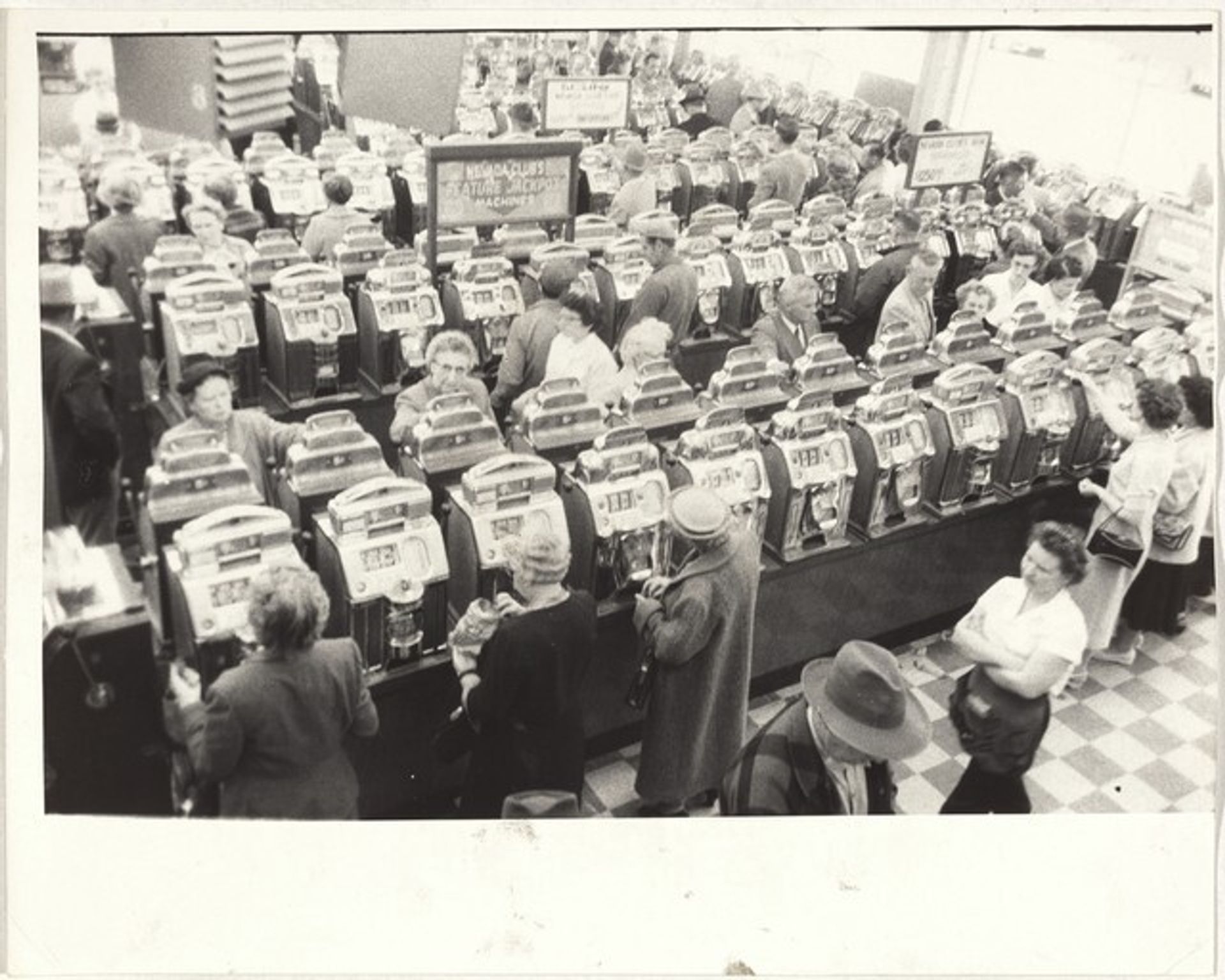 Slot machines--Reno, Nevada by Robert Frank
