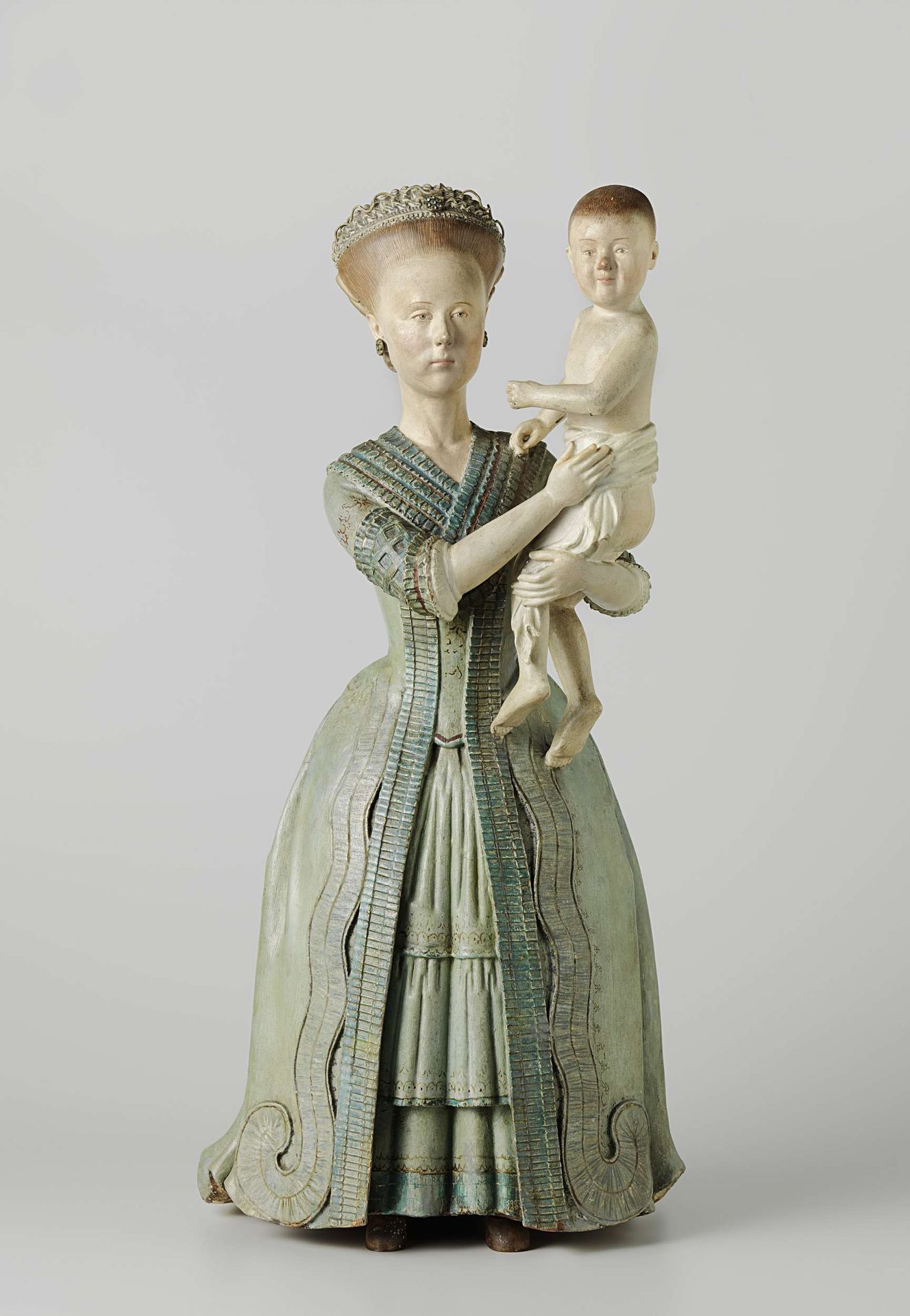 Woman Holding a Child by Chitqua