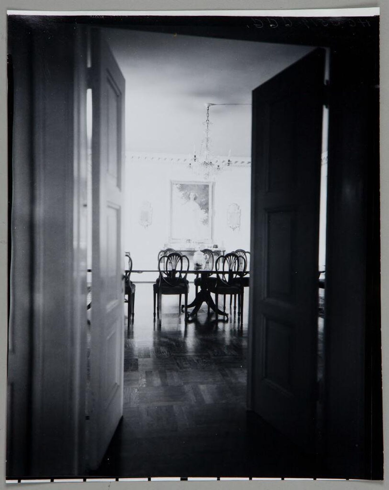 Untitled (view through double doors into dining room) by Paul Gittings