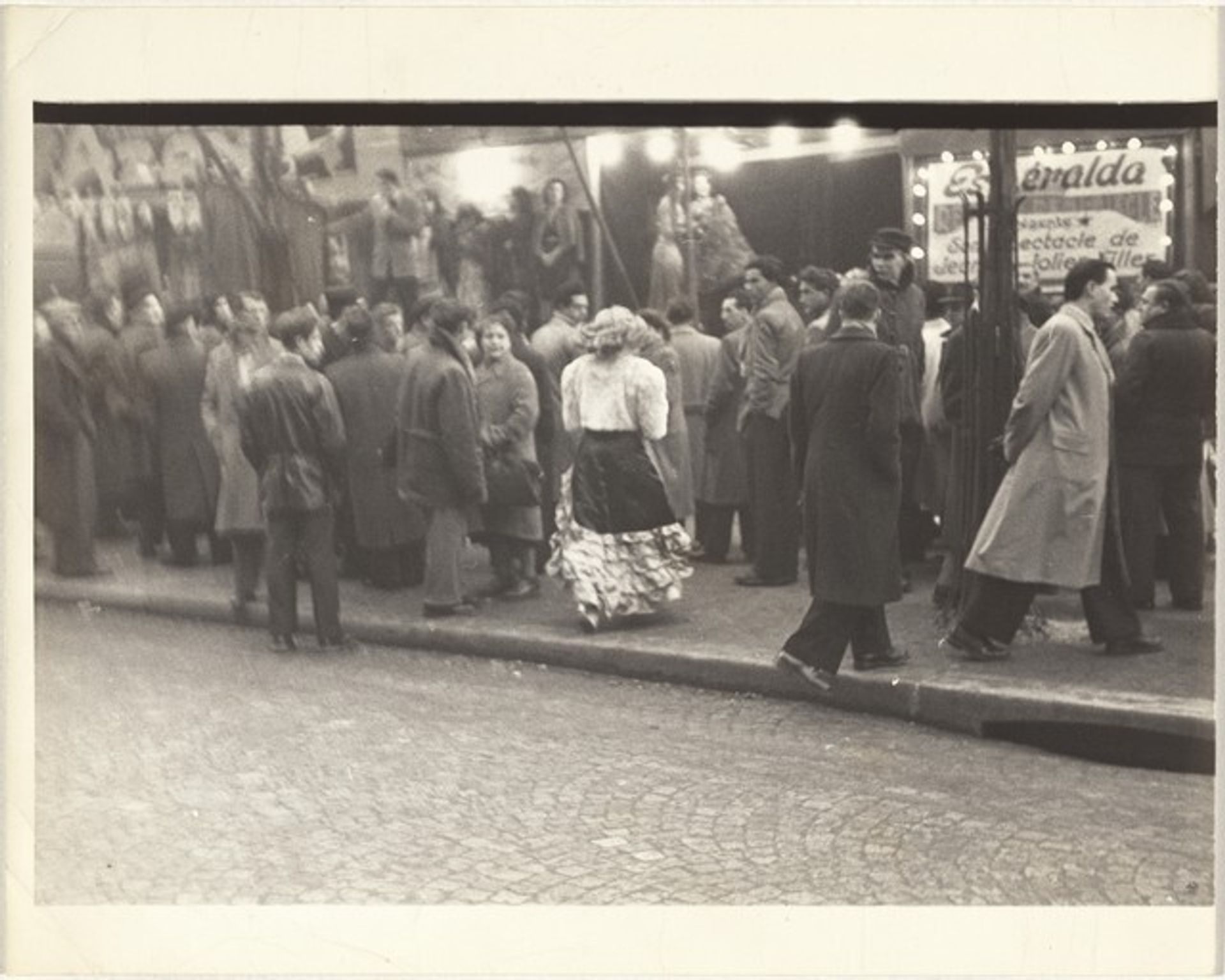 Girl crossing street, Paris by Robert Frank