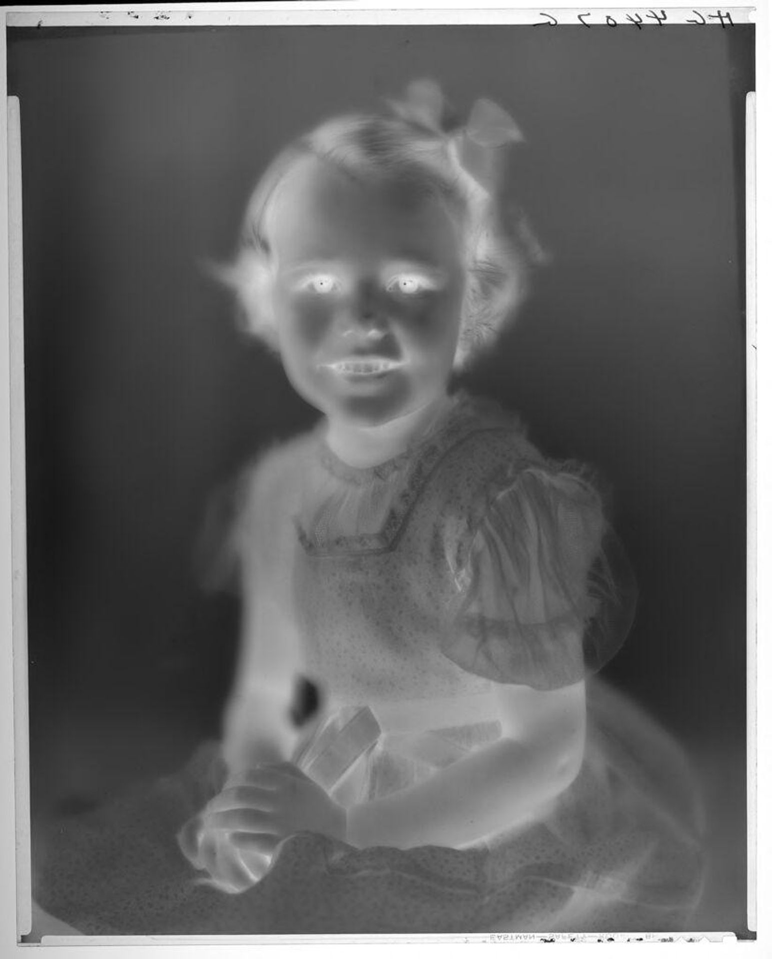 Untitled (portrait of little girl with lace on sleeves and collar of dress)v by Paul Gittings
