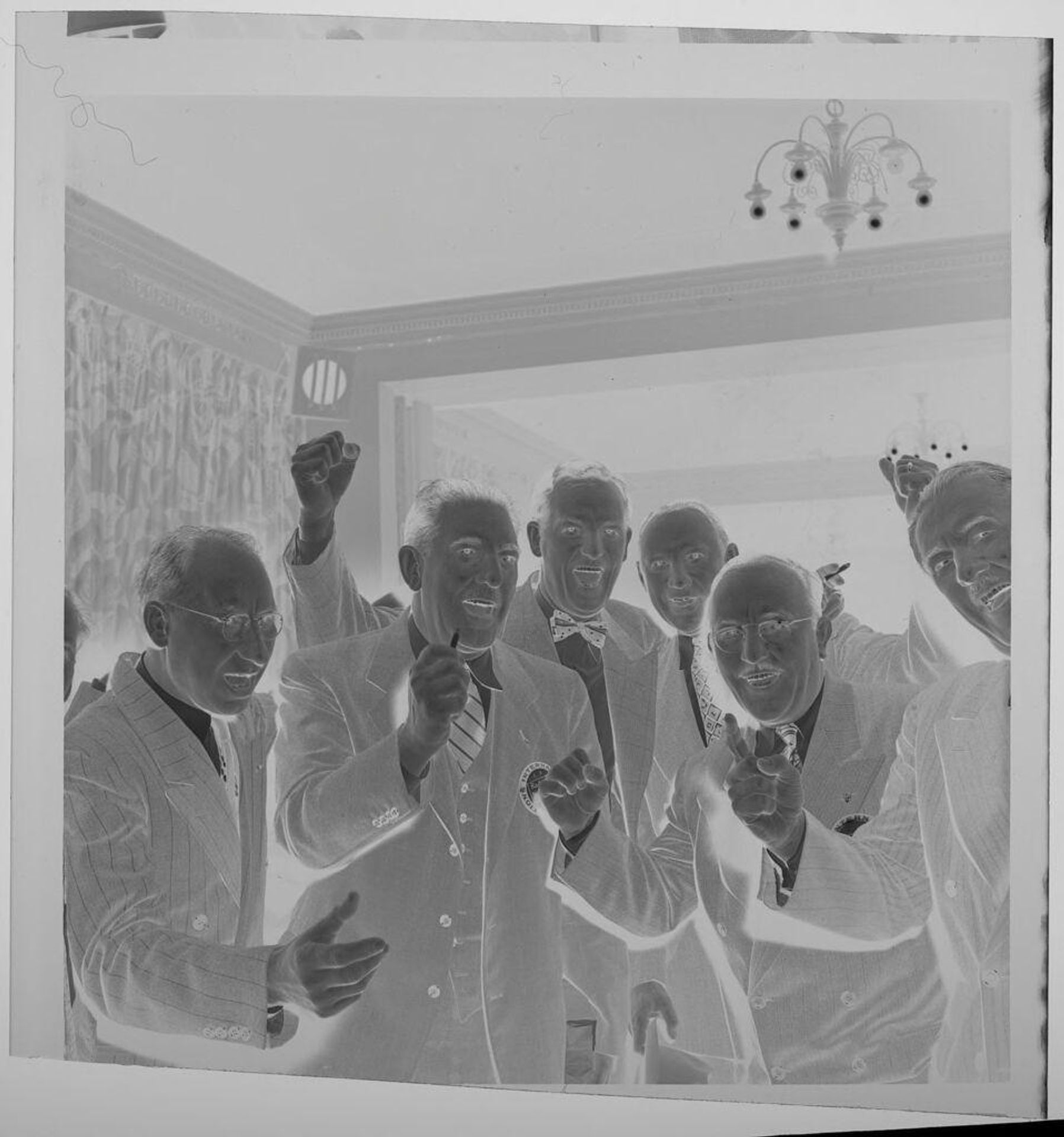 Untitled (men smiling at Lion's Club meeting) by Jack Gould