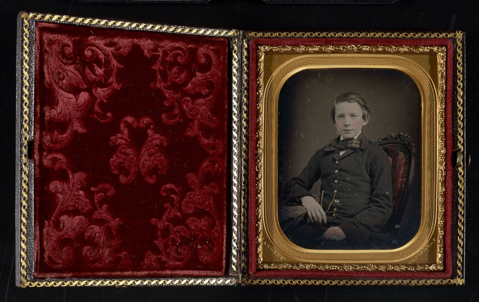 Untitled [portrait of a boy seated in the 'Gurney chair'] by Jeremiah Gurney