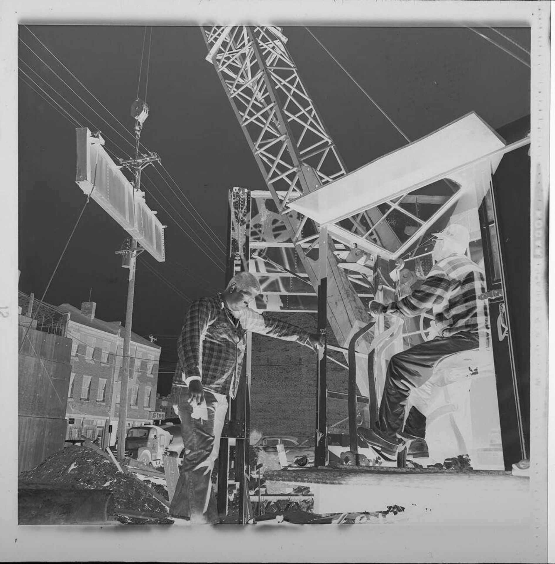 Untitled (construction of buildings, two men with crane) by Jack Gould