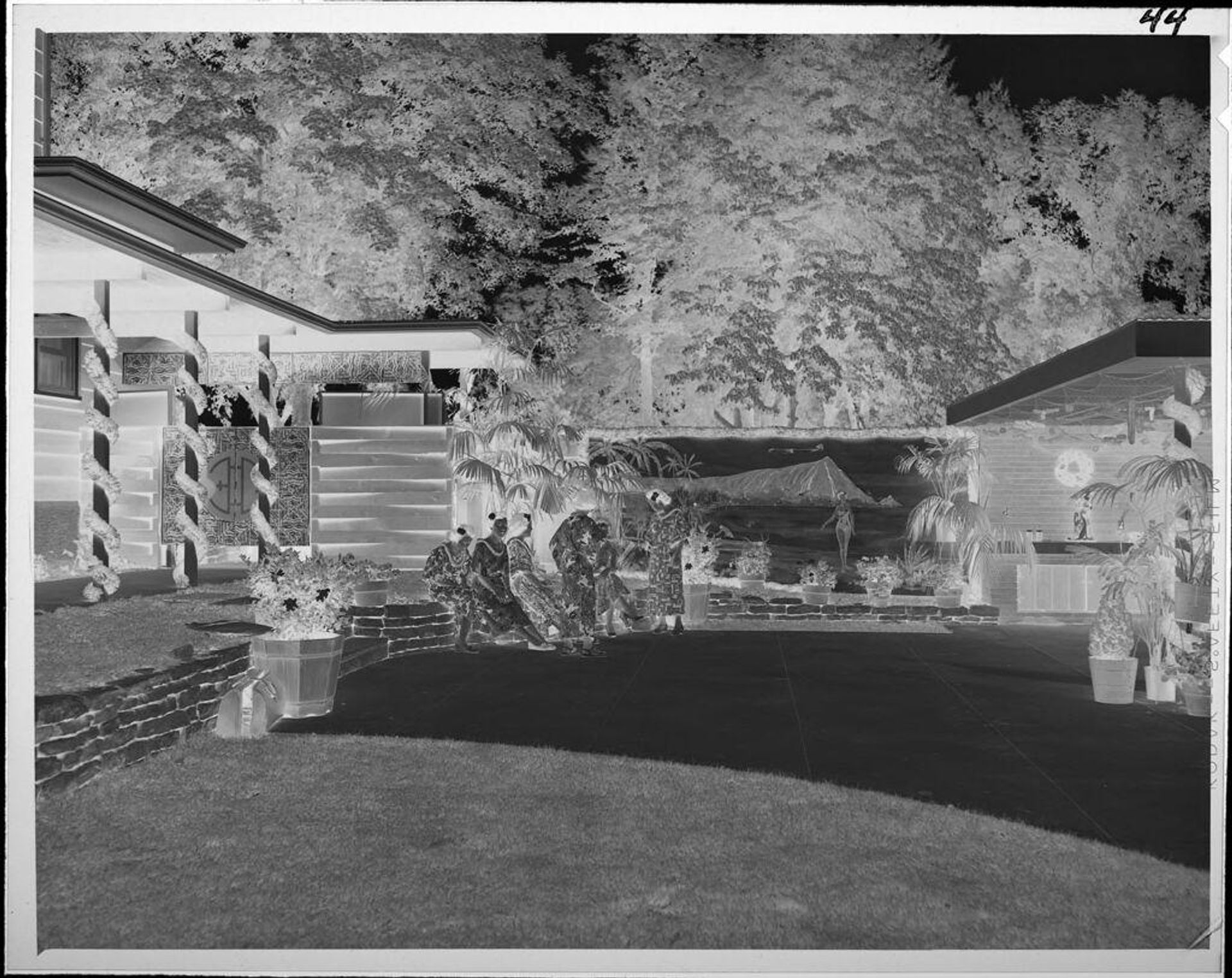 Untitled (back yard decorated for luau) by Lucian and Mary Brown