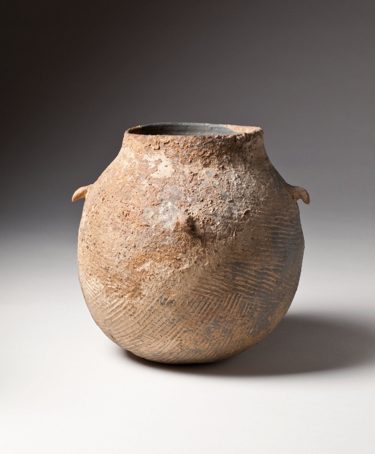 Jar with four knobs by Anonymous