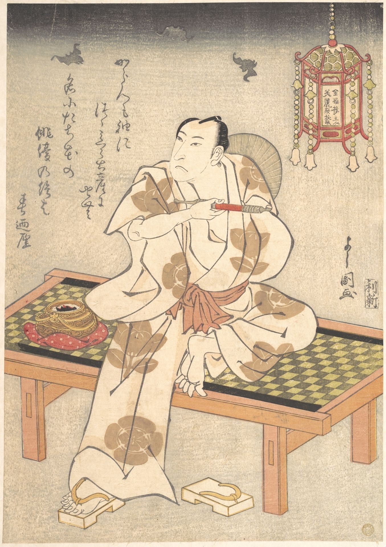 An Actor of the Ichimura Line Sitting on a Shogi (Wooden Bench) and Holding a Pipe by Ippyotei Yoshikuni