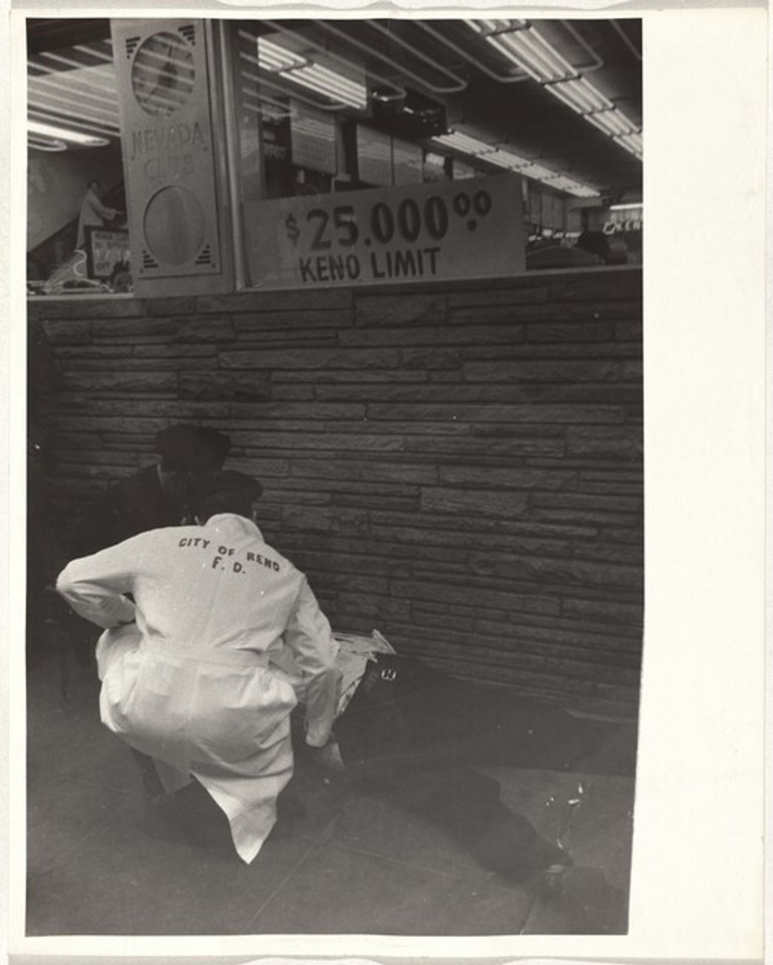 Paramedics with victim--Reno, Nevada by Robert Frank