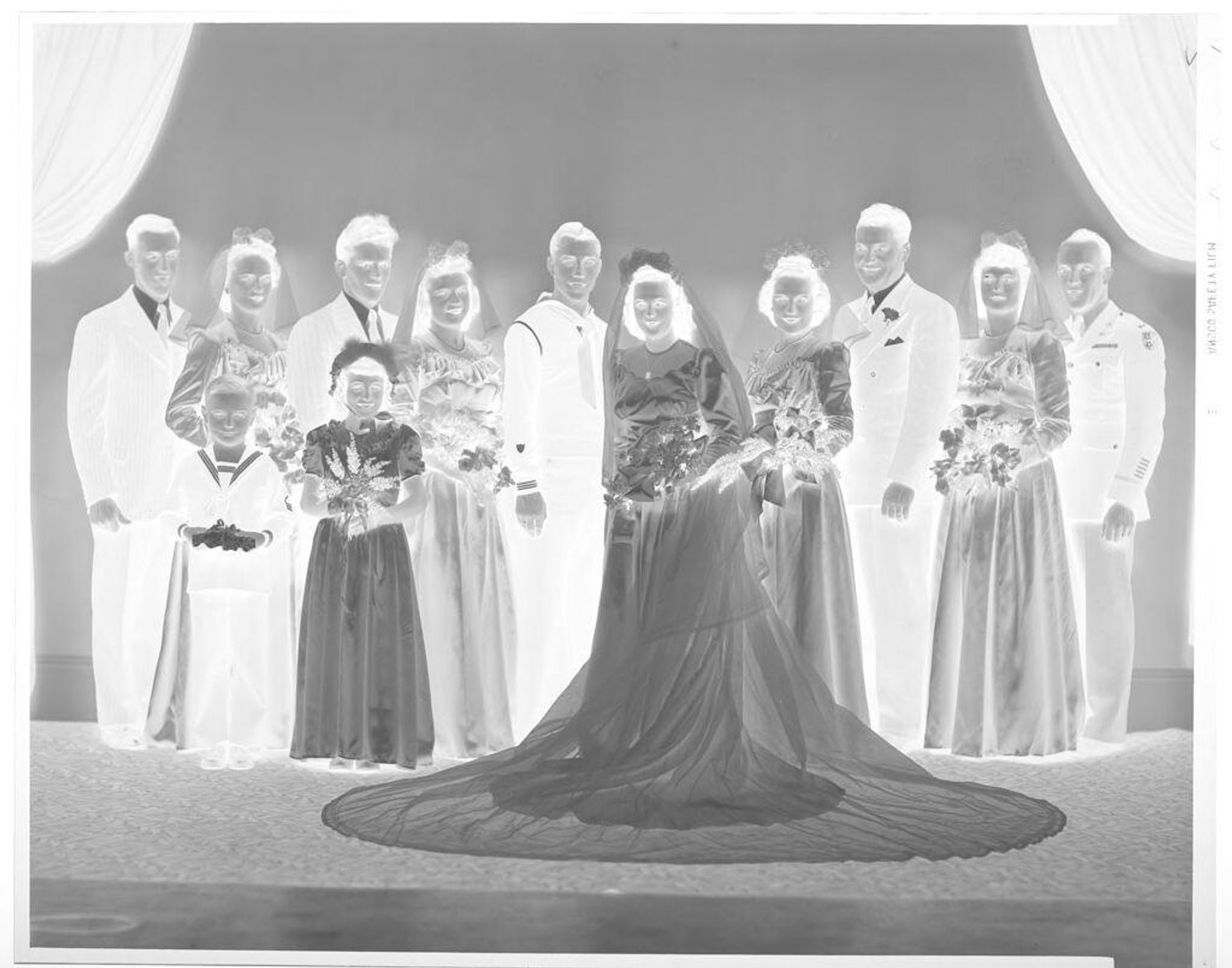 Untitled (bridal party posed in studio) by John Deusing