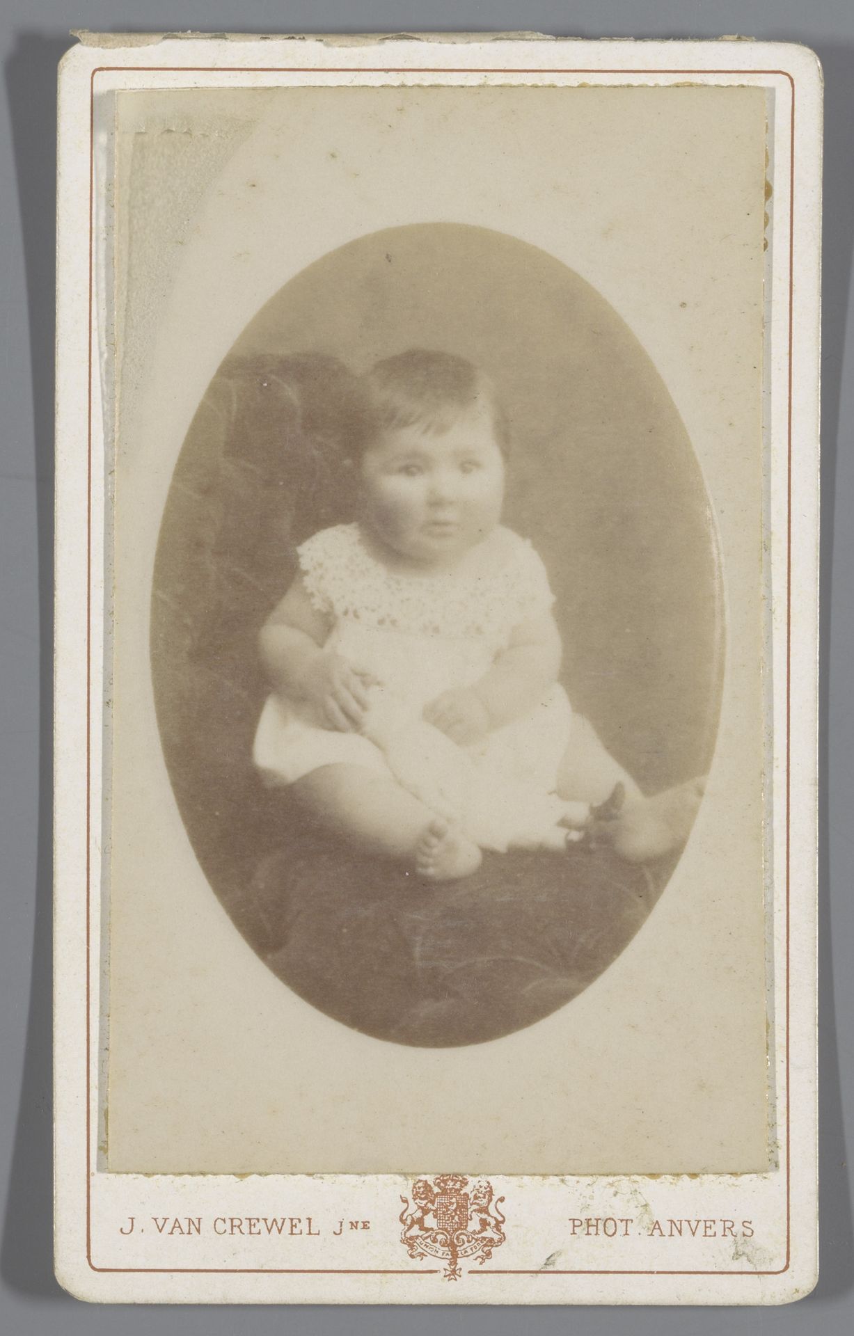 Portret van een onbekende baby op een fauteuil by J. Van Crewel Jeune