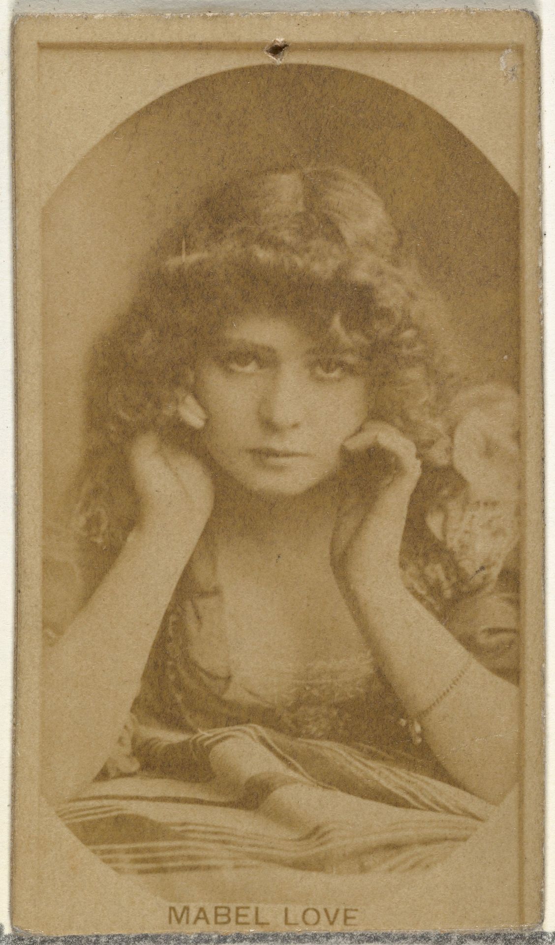 Mabel Love, from the Actors and Actresses series (N145-8) issued by Duke Sons & Co. to promote Duke Cigarettes by W. Duke, Sons & Co.