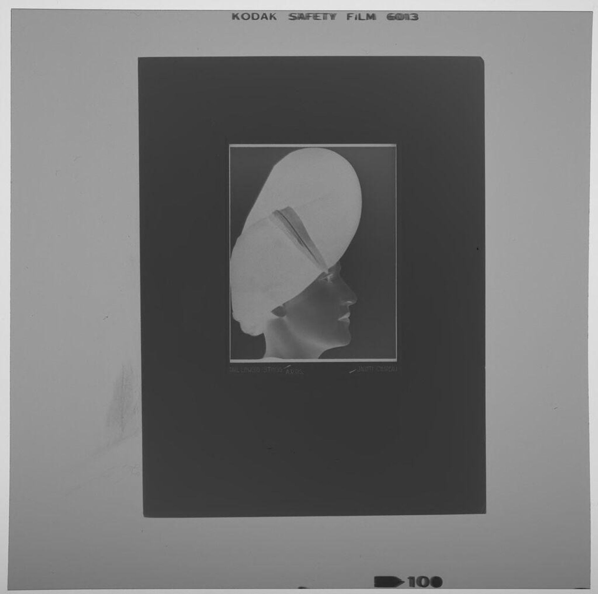Untitled (photograph of "Jaunty Chapeau": woman in assymetrical hat) by Paul Gittings
