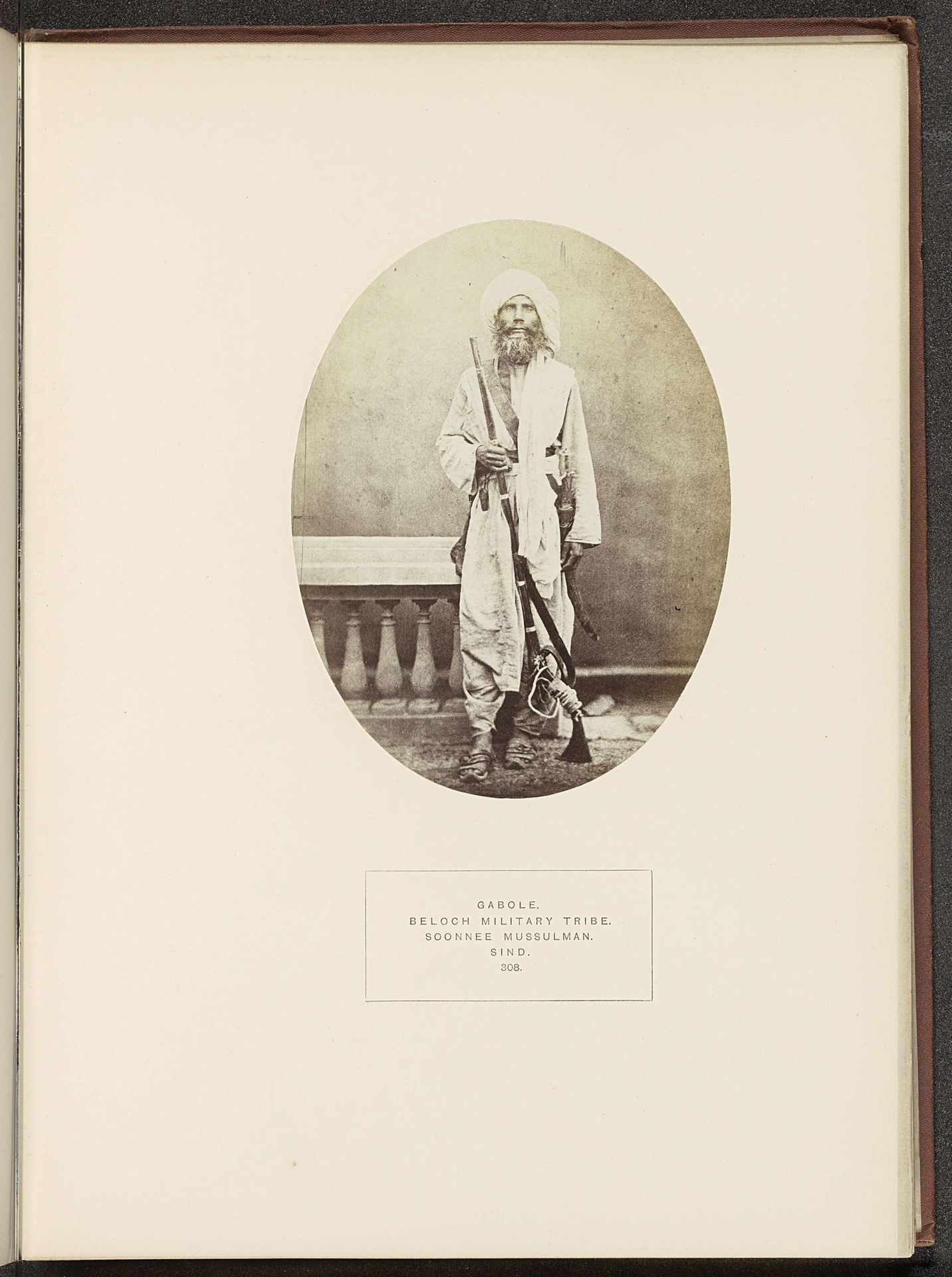 Portret van een onbekende man van de Gabol-stam met een geweer by Henry Charles Baskerville Tanner
