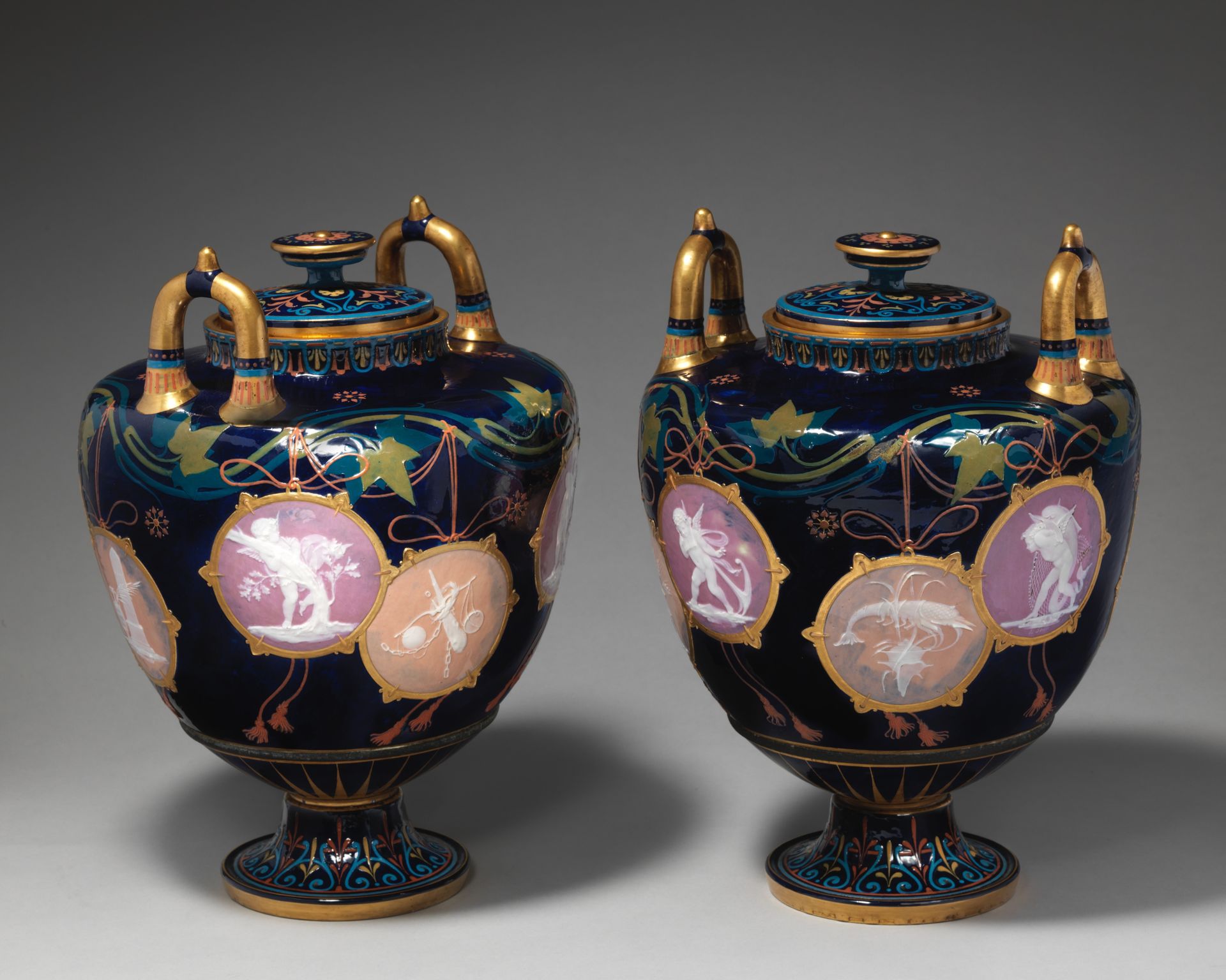 Pair of "Pompeian" vases with covers by Minton(s)