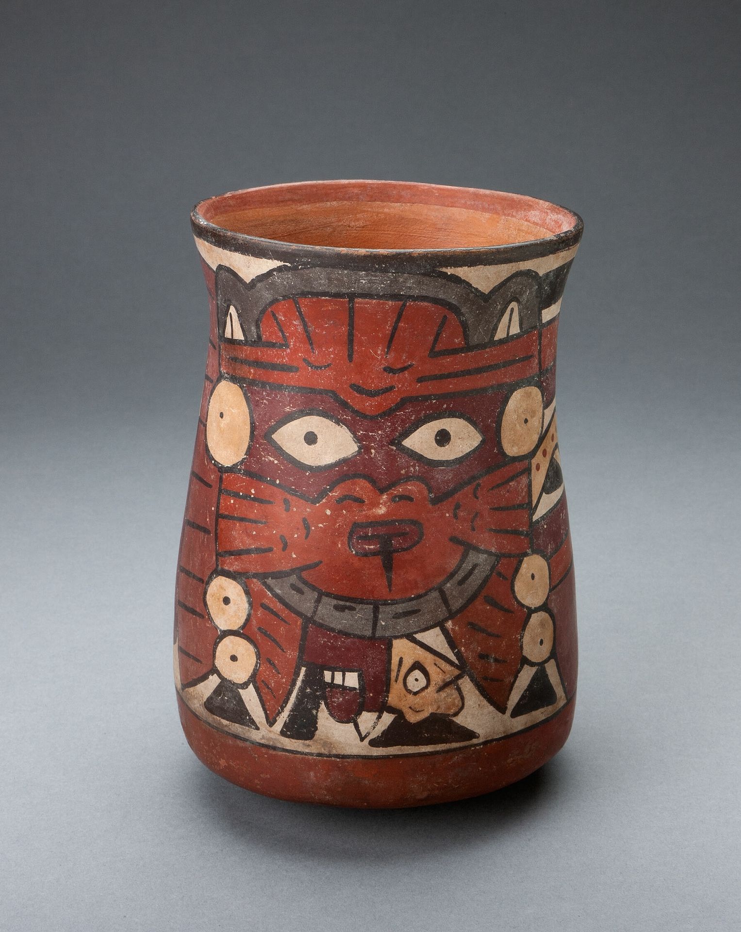 Beaker Depicting a Costumed Performer Holding Decapitated Head by Nazca