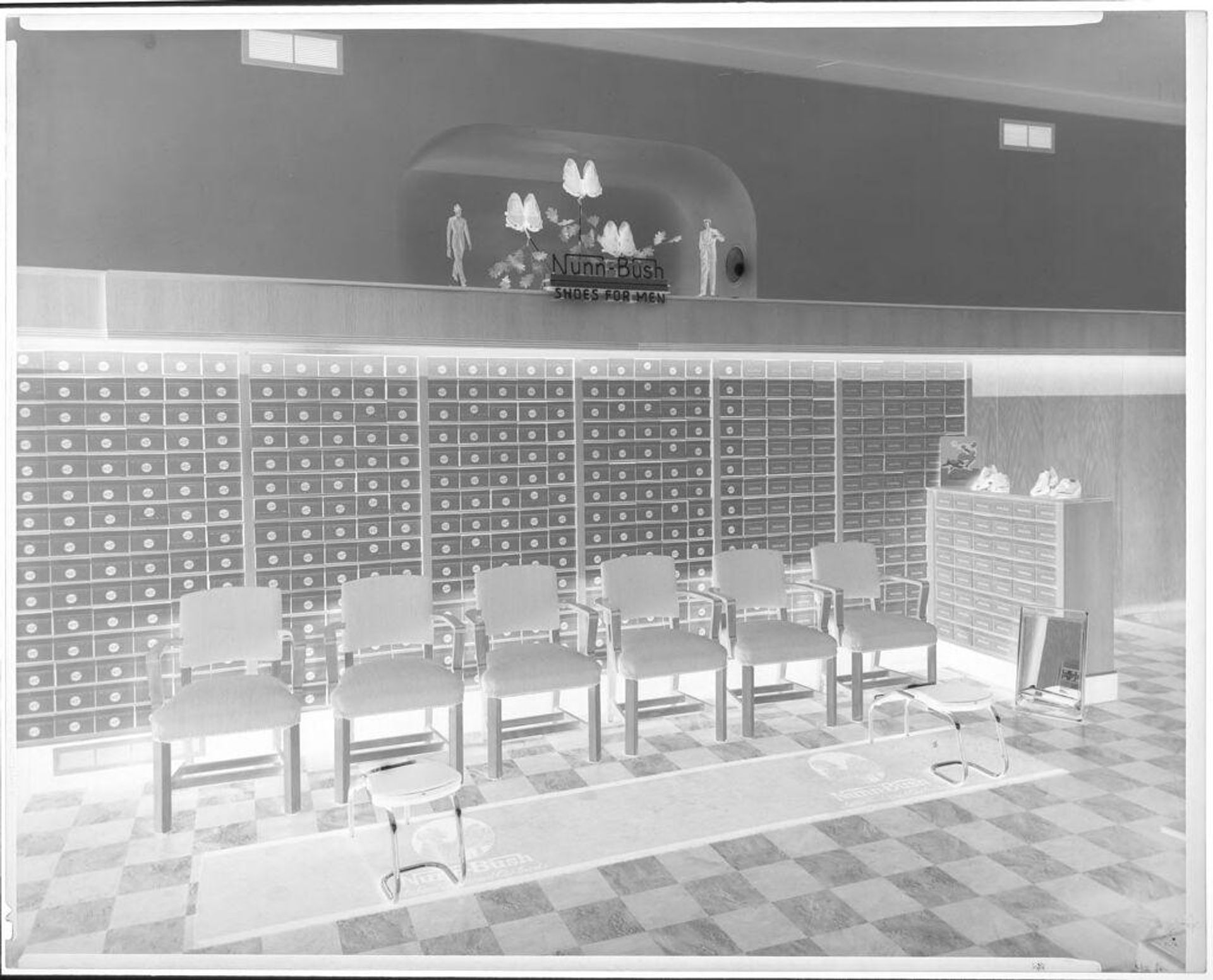 Untitled (Nunn-Bush shoe store interior) by John Deusing