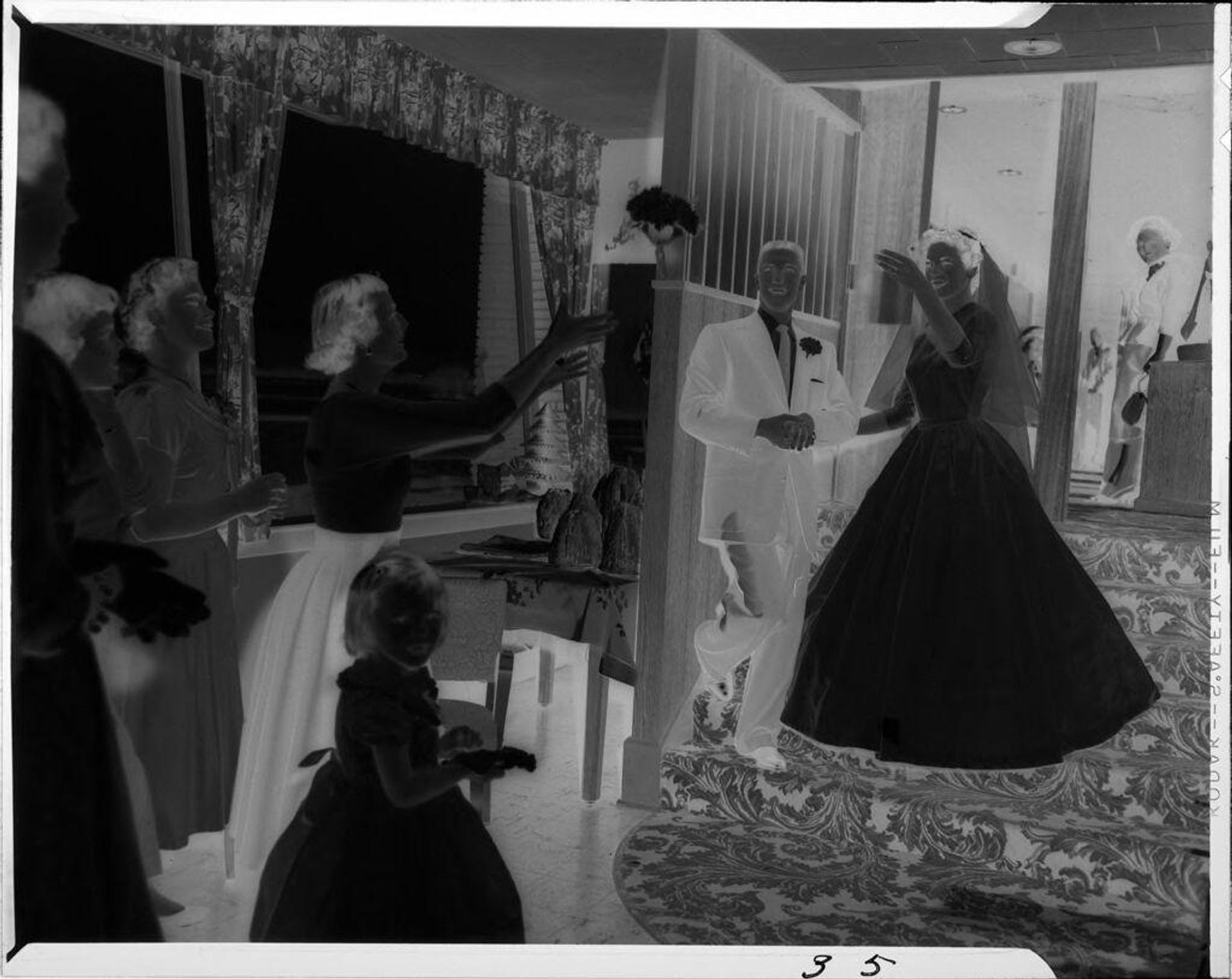 Untitled (bride tossing bouquet) by Ken Whitmire Associates