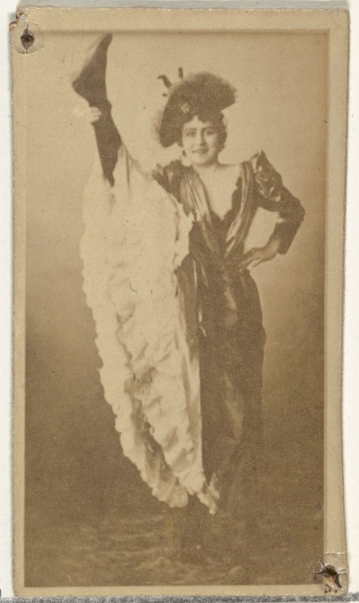 [High kick of dancer], from the Actors and Actresses series (N145-8) issued by Duke Sons & Co. to promote Duke Cigarettes by W. Duke, Sons & Co.